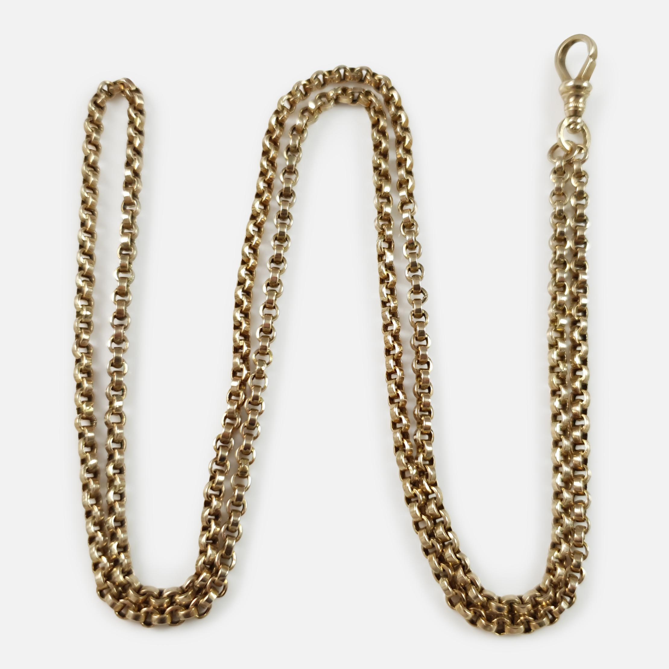 Description: - This is a superb antique Victorian 9 karat yellow gold hollow link long guard muff chain with associated dog clip.

Date: - Circa 1890.

Measurement: - The chain measures approximately 30 1/2 inches (77.5cm) in length.

Complimentary