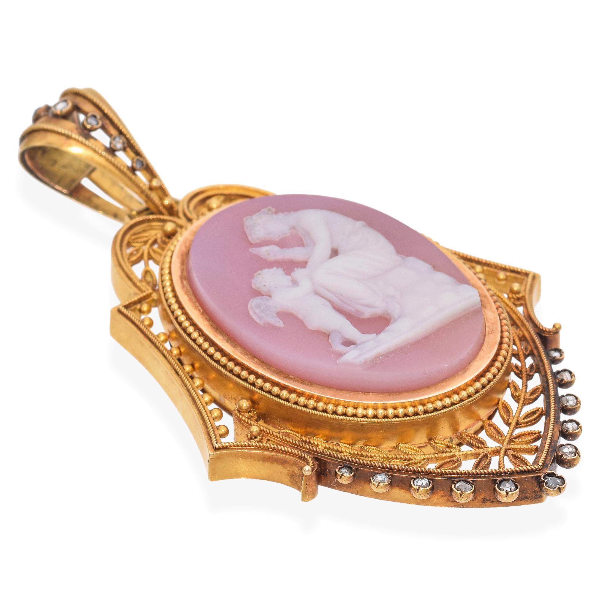 A remarkable Victorian pendant showcasing exquisite craftsmanship.
Crafted in luxurious gold, this pendant features an intricately carved cameo at its center. The cameo depicts a delicate scene of a seated figure interacting with a cherub, rendered