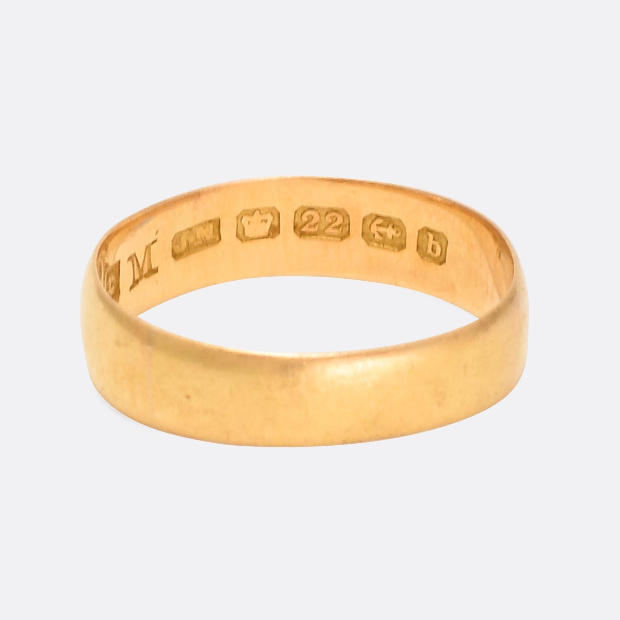 A fine antique wedding ring dating from the final year of Queen Victoria’s reign. Appropriate for a man or woman, it’s crafted in 22 karat gold and fully hallmarked by the Birmingham assay office. The width is 4.6mm, and the ring has developed a
