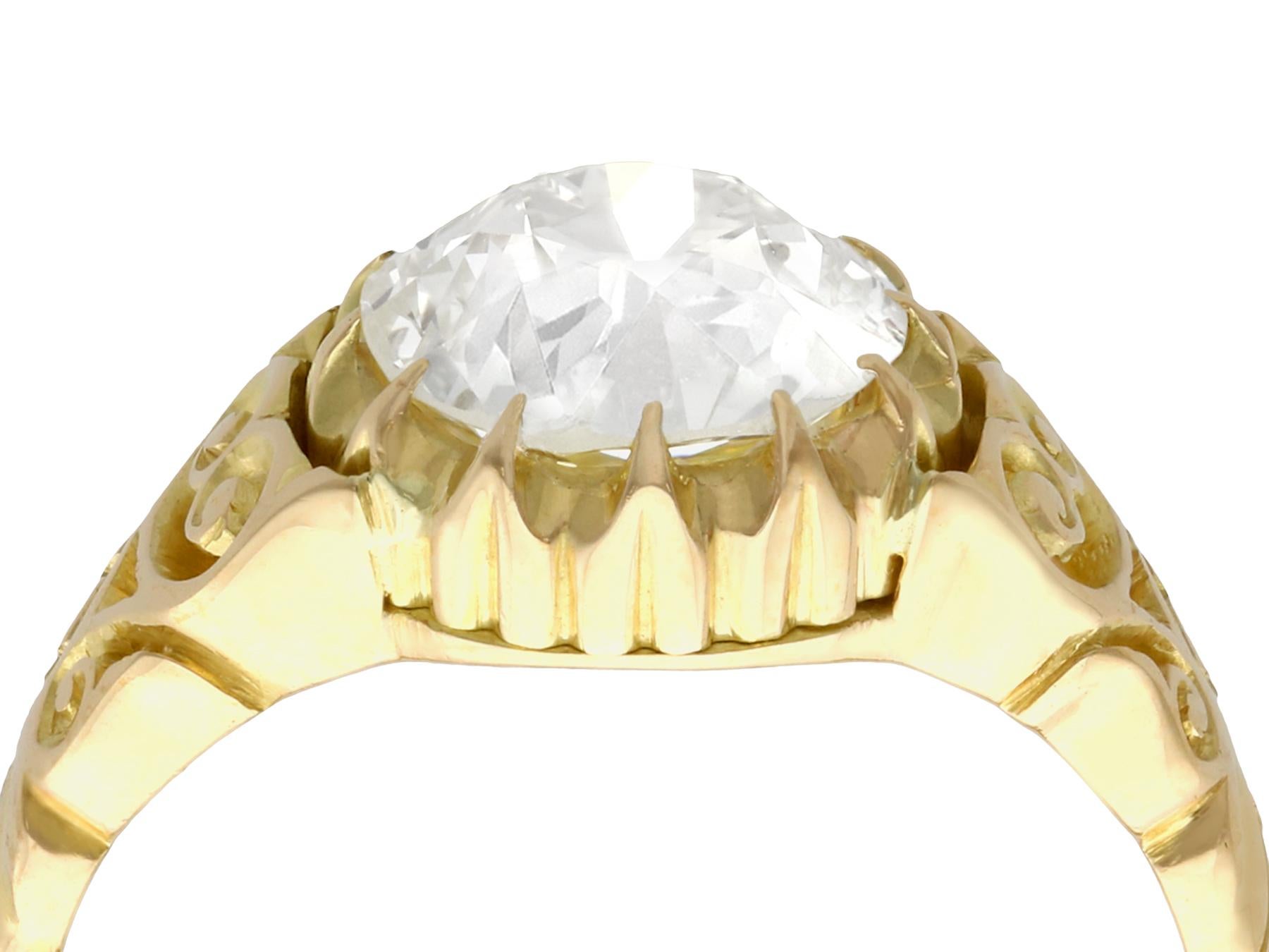 An exceptional antique Victorian 2.30 carat old European round cut diamond, 18 karat yellow gold solitaire ring; an addition to our engagement ring collections

This exceptional, fine and impressive antique diamond solitaire ring has been crafted in