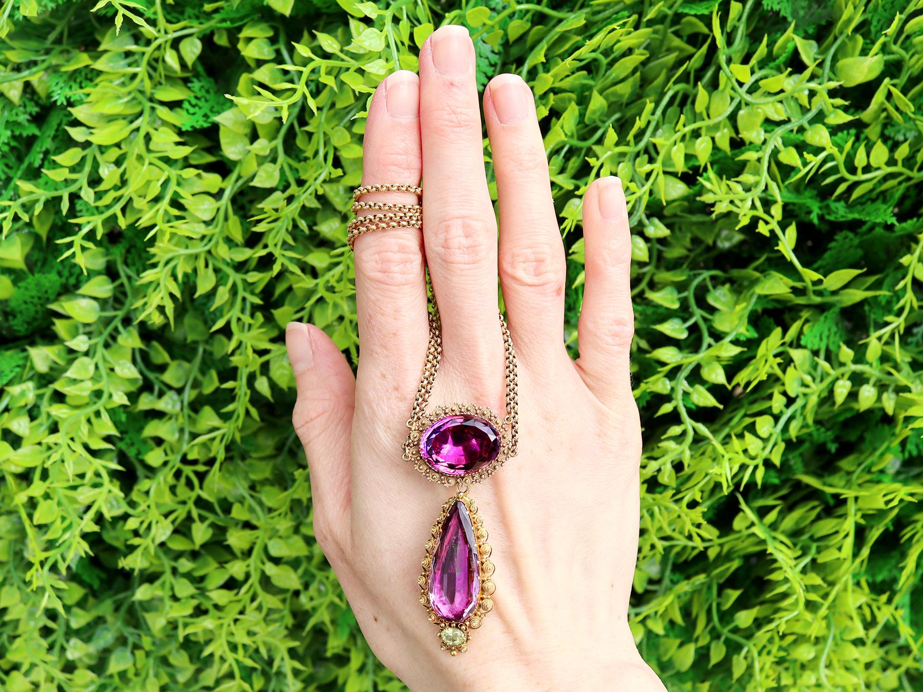 A stunning, fine and impressive Victorian 24.68 carat amethyst and 18 karat yellow gold necklace; part of our diverse antique jewelry collections.

This stunning, fine and impressive amethyst necklace has been crafted in 18k yellow gold.

The