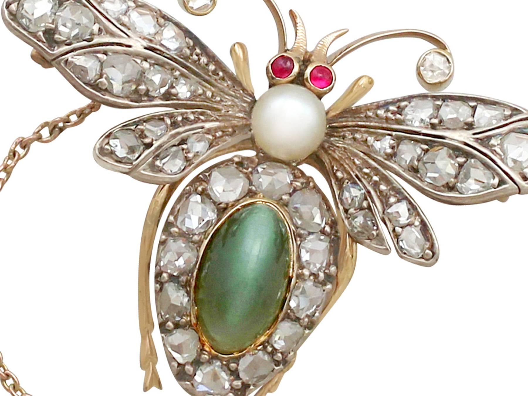 This exceptional antique insect brooch has been crafted in 9k yellow gold with a silver setting, in the form of a paired winged bee.

The head of this impressive Victorian insect brooch is embellished with two cabochon ruby eyes and scrolling