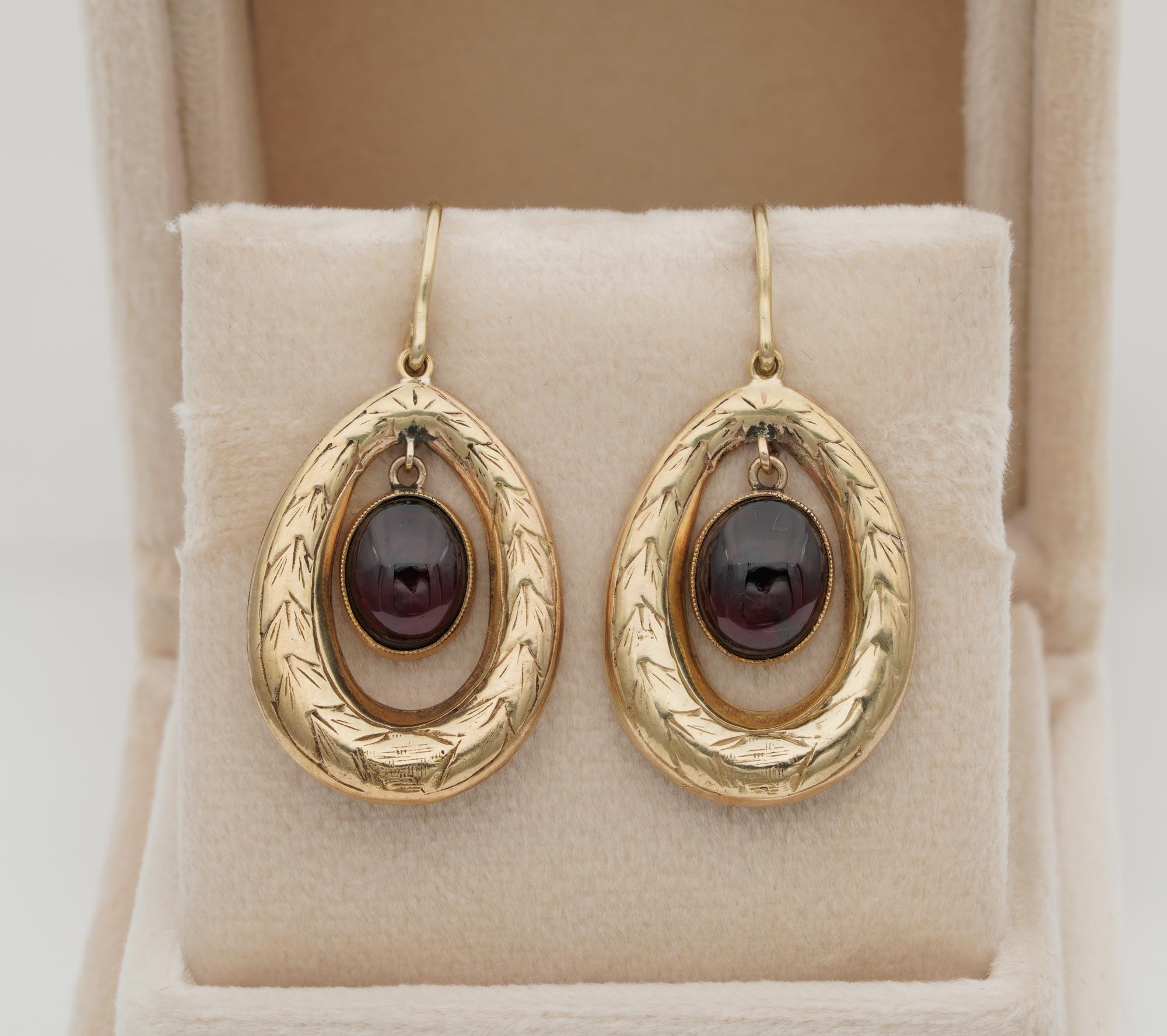 Ageless Victorian Allure

Beautiful pair of Victorian period Garnet Drop earrings
Timeless in beauty designed in a carved Wreath of gold framing the swinging drop of Garnet attracting the attention with the fabulous Bohemian Red glowing in the