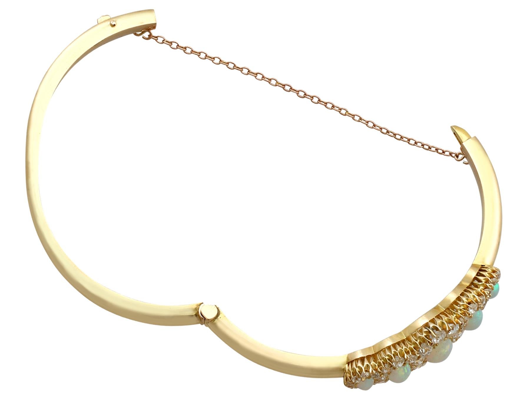 Antique Victorian 3.92 Carat Opal and 3.25 Carat Diamond Yellow Gold Bangle In Excellent Condition For Sale In Jesmond, Newcastle Upon Tyne