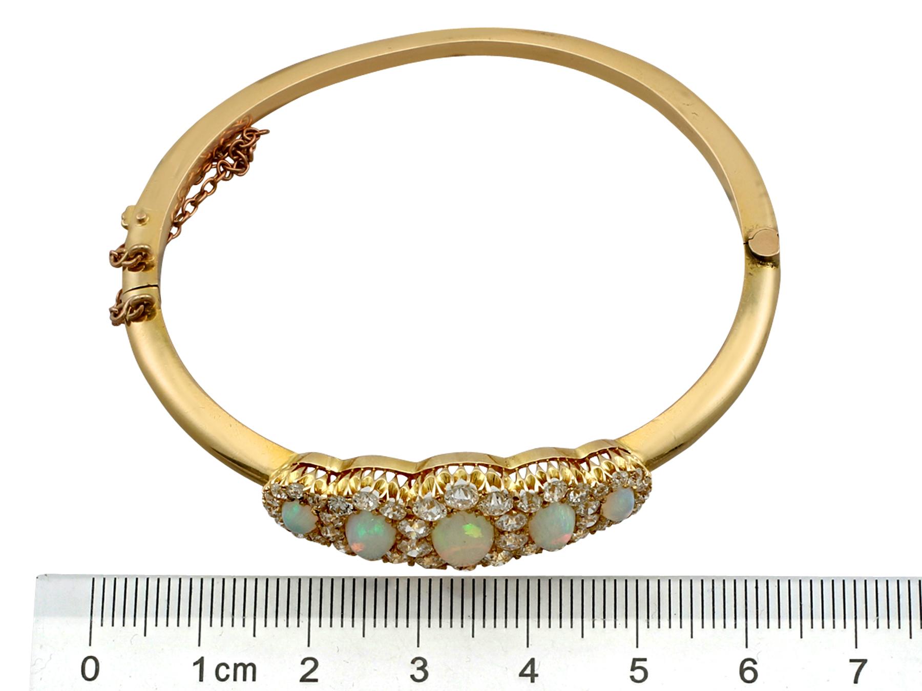 Antique Victorian 3.92 Carat Opal and 3.25 Carat Diamond Yellow Gold Bangle For Sale 1