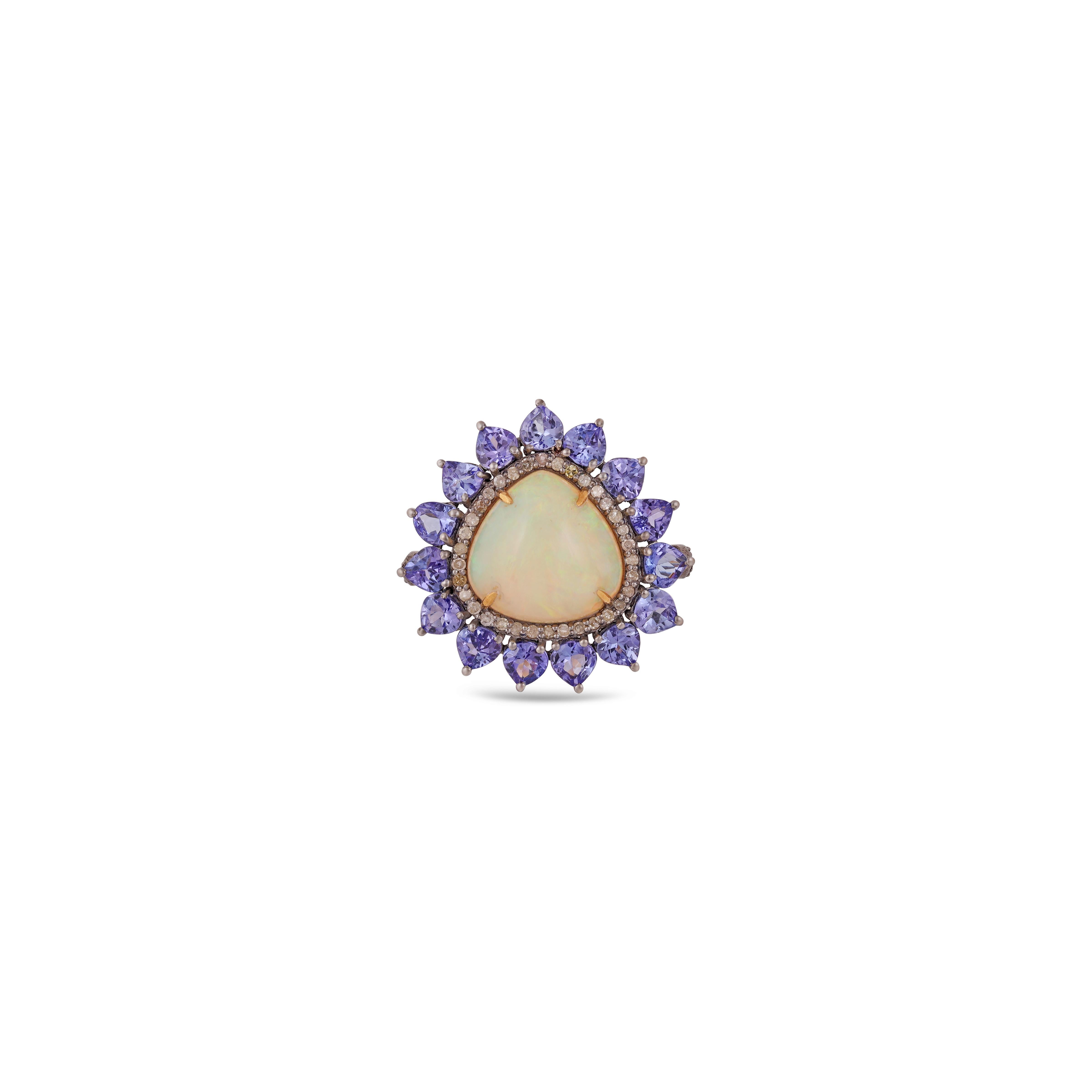 Beautiful Antique Victorian 14K Yellow Gold & silver Opal, Tanzanite &  Diamond Cocktail Ring. This incredible cocktail ring is crafted in 14k yellow gold & silver . The center holds a natural vibrant Opal with an incredible play of color pattern.