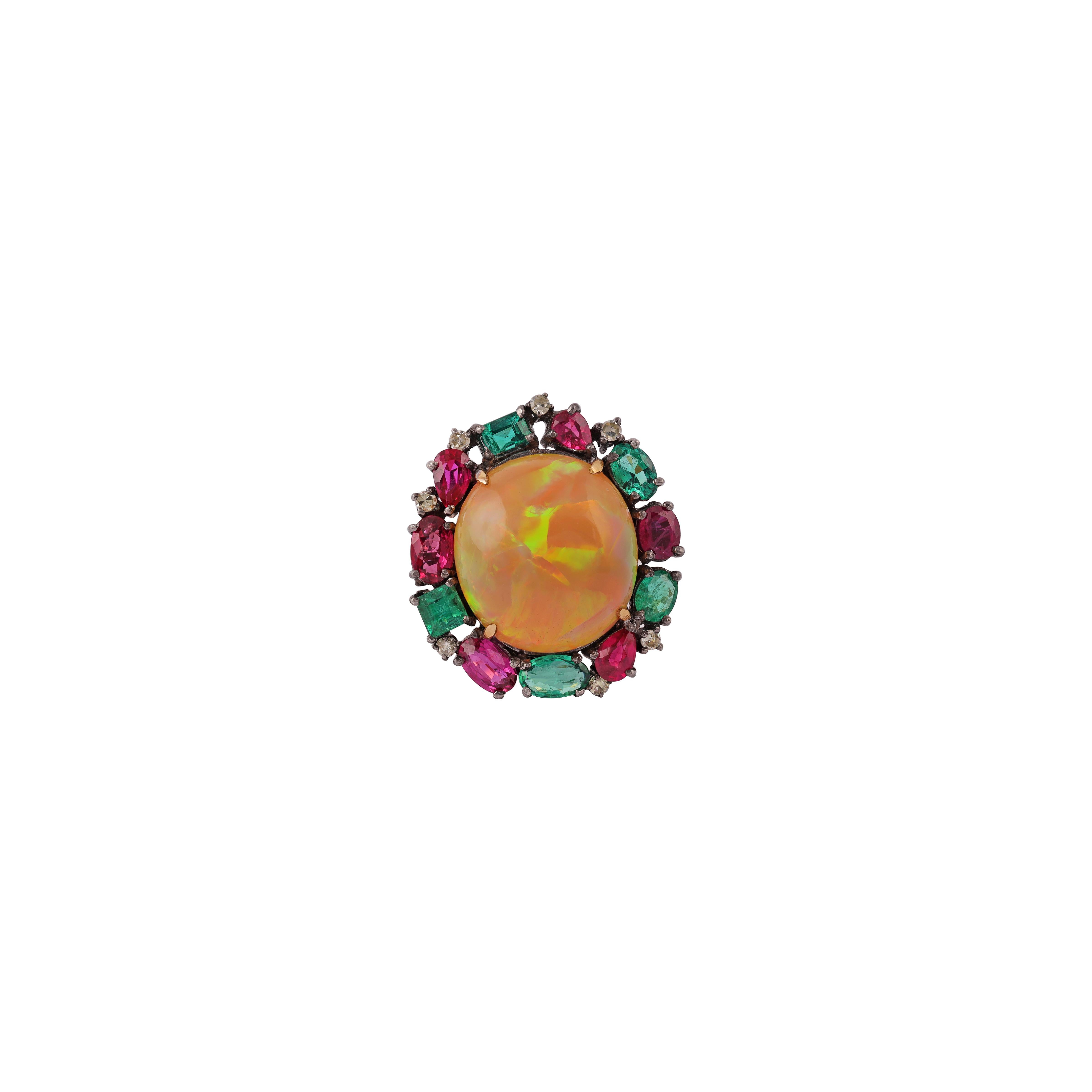 Beautiful Antique Victorian 14K Yellow Gold & silver  Fire Opal Emerald &  Diamond Cocktail Ring. This incredible cocktail ring is crafted in 14k yellow gold & silver . The center holds a natural vibrant opal with an incredible play of color