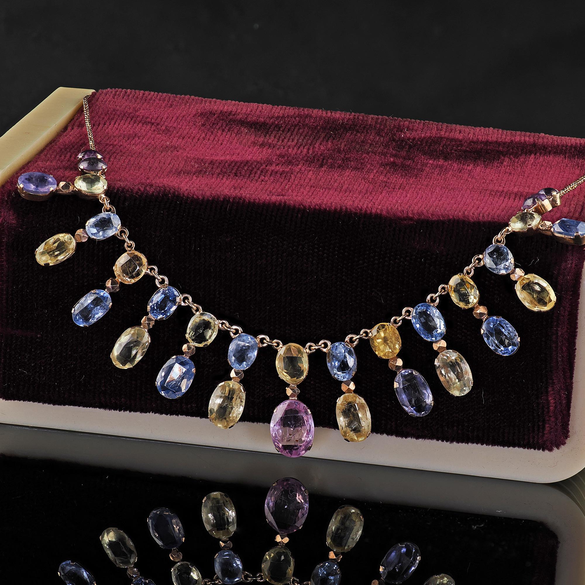 Beautiful Antique Victorian 8K Yellow Gold Natural Sapphire Graduated Necklace - GIA. This gorgeous Antique Victorian natural sapphire necklace is crafted in 8k yellow gold. This gorgeous necklace has graduated natural sapphires throughout the drops