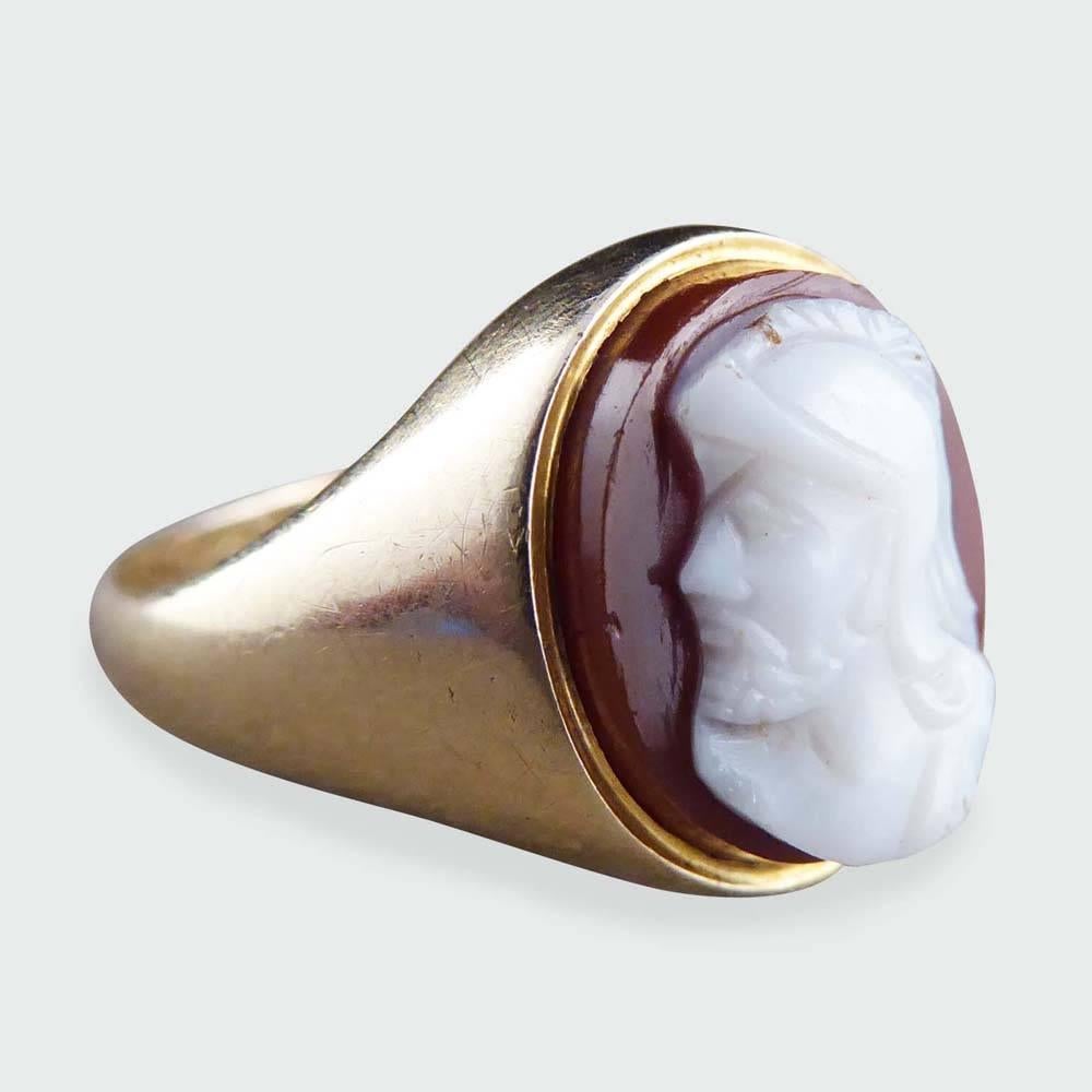 Antique Victorian 9 Ct Gold Hardstone Cameo Ring Depicting Male Head

Ring Size: UK N 1/2 or US 7

Condition: Good, slightest signs of wear due to age and use

Defects: Very slight movement in cameo

Date / Period: Victorian

Marks: 9ct
