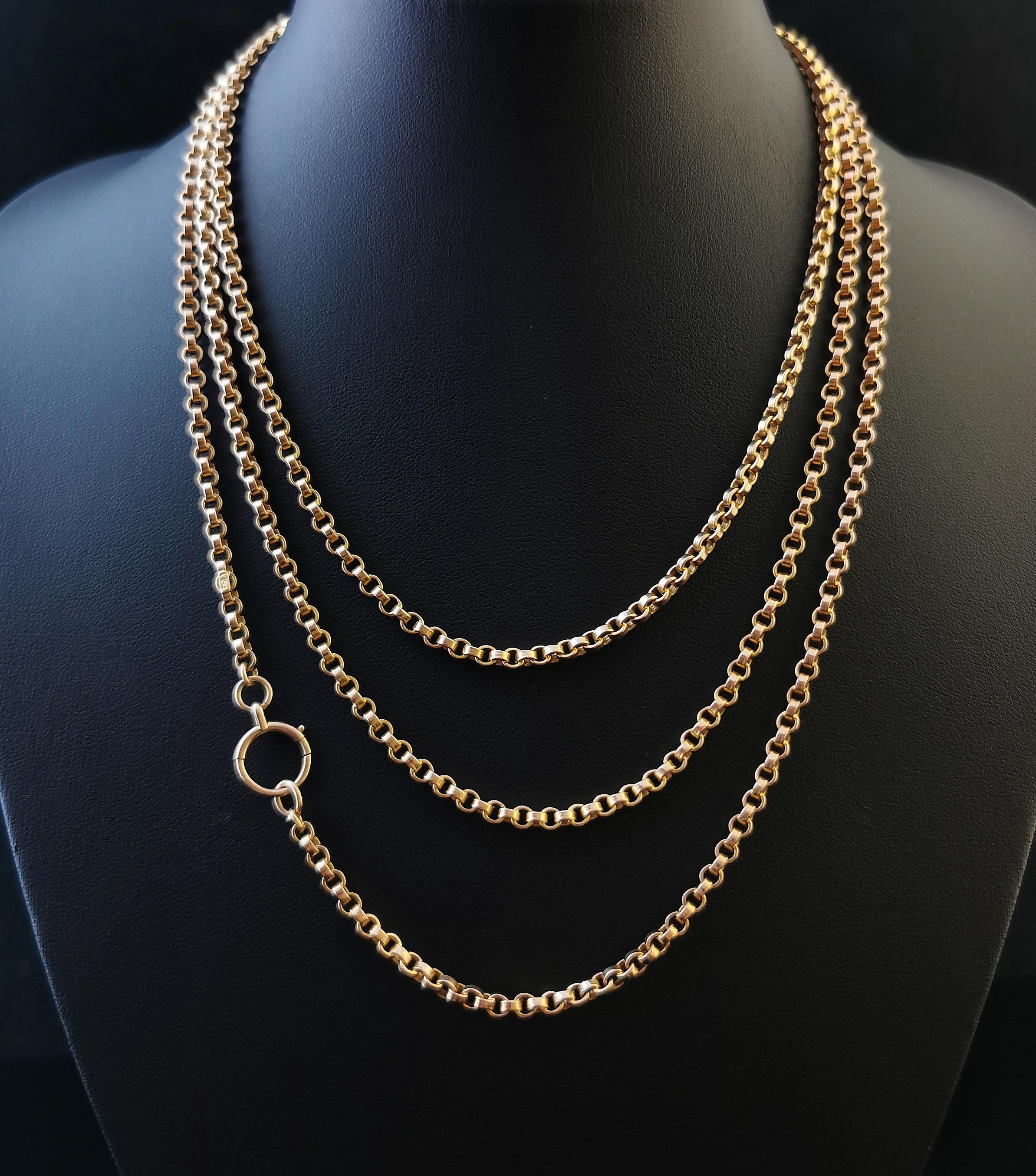 A gorgeous antique, late Victorian 9kt yellow gold longuard chain also known as a muff chain necklace.

This long chain has a lovely rich old yellow gold glow to it with compact but chunky rolo links and a superb 55