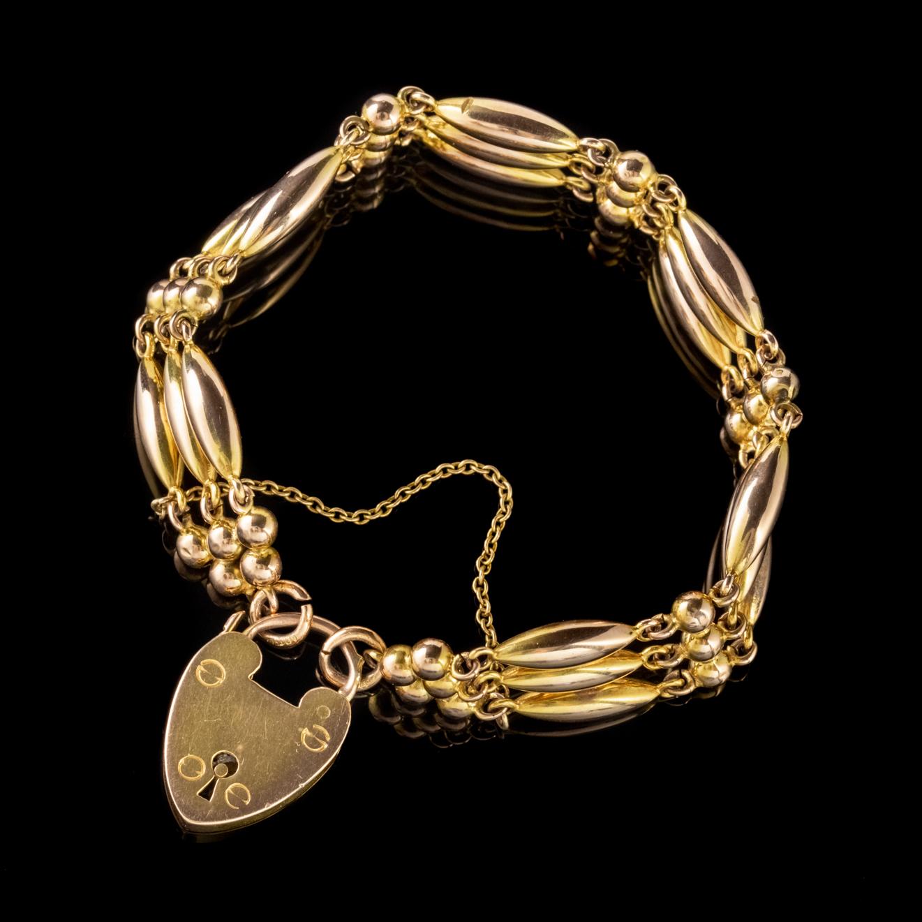 A special antique Victorian bracelet made up of fancy 9ct Yellow Gold torpedo links leading to a lovely detachable heart padlock which holds it all together. 

Hearts were a popular motif in the Victorian era and of course symbolised romance and