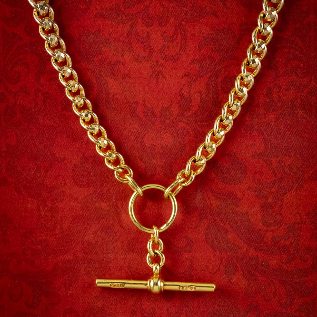 A luxurious antique Victorian Albert chain from the late 19th Century consisting of solid 9ct gold curb links, with faceted rollerball links in between. Each is stamped “375/ 9ct” and has a warm, yellow gold bloom.

Albert chains were popularised