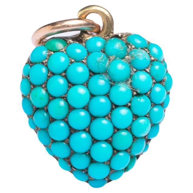 This unique antique 9ct gold heart pendant was made circa 1870 and it's set with turquoise stones. Turquoise in the Victorian period represented 'Forget me not flower' and it became a symbol of true love and remembering and cherishing special