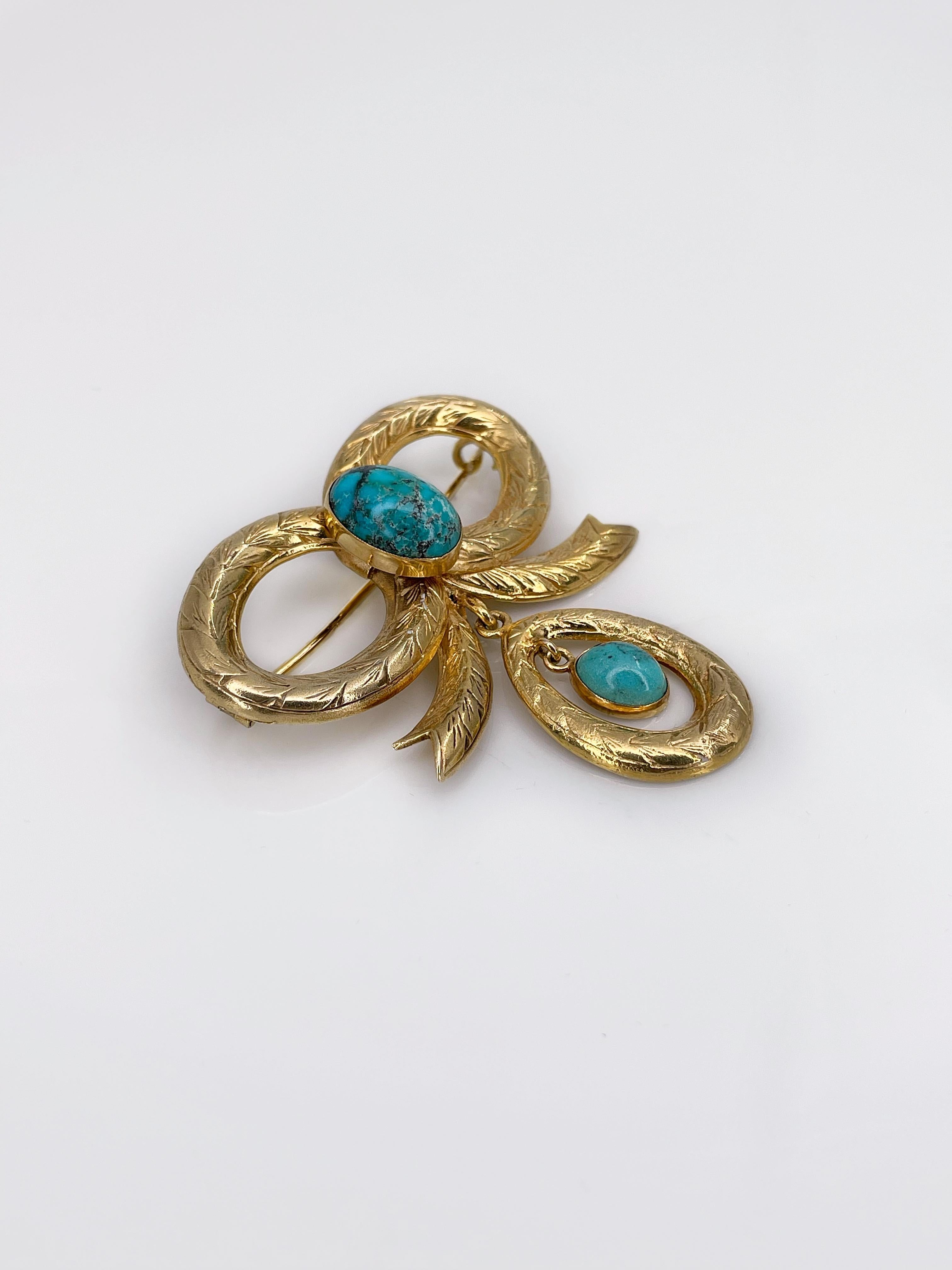 Romantic antique bow design engraved chandelier brooch in 9ct gold. It features two cabochon cut turquoises.



Size: 5,3x5,2cm

Weight: 17,43g

