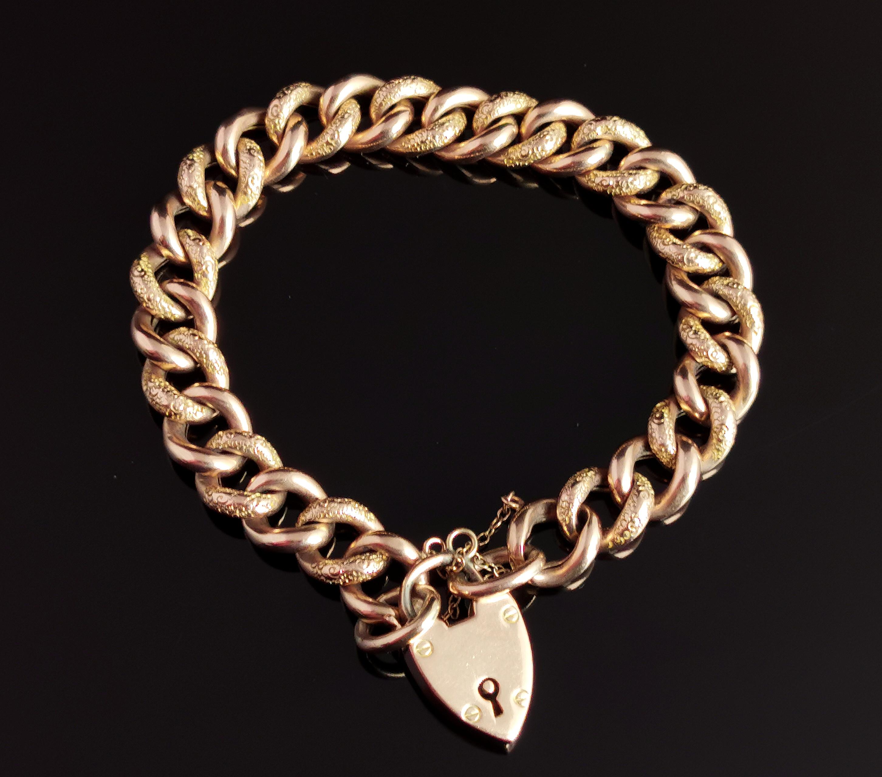 A stunning antique, late Victorian era 9kt gold curb bracelet.

Chunky rich gold curb links, each individually engraved on one side and plain on the other, designed to go effortlessly from day to night wear.

The gold has both yellow and rosey tones