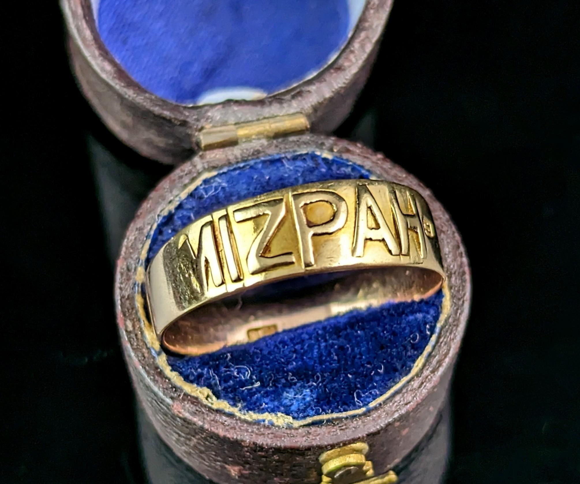 A beautiful, Victorian 9ct gold Mizpah ring.

It is a band style ring with applied yellow gold lettering to the front of the band spelling out Mizpah.

This ring is a two toned gold as it has a replacement half band, the front yellow gold and the