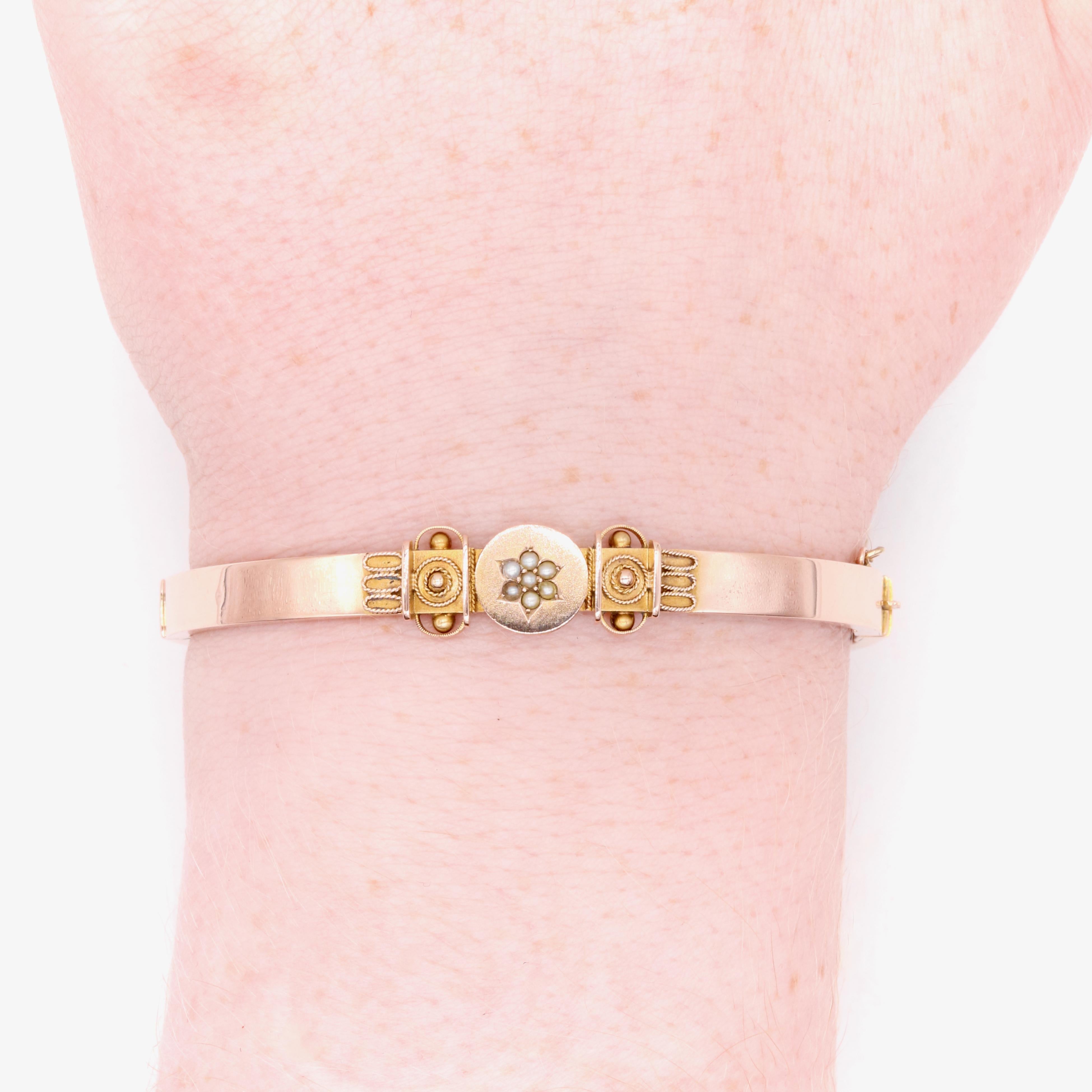 A Victorian seed pearl, and rosy-yellow gold bangle, comprising seven seed pearls, in 9 karat yellow gold. 

My favourite thing about this Antique 9K Gold Pearl Bangle, is the Etruscan revival design. What’s yours? Perhaps the shimmering seed