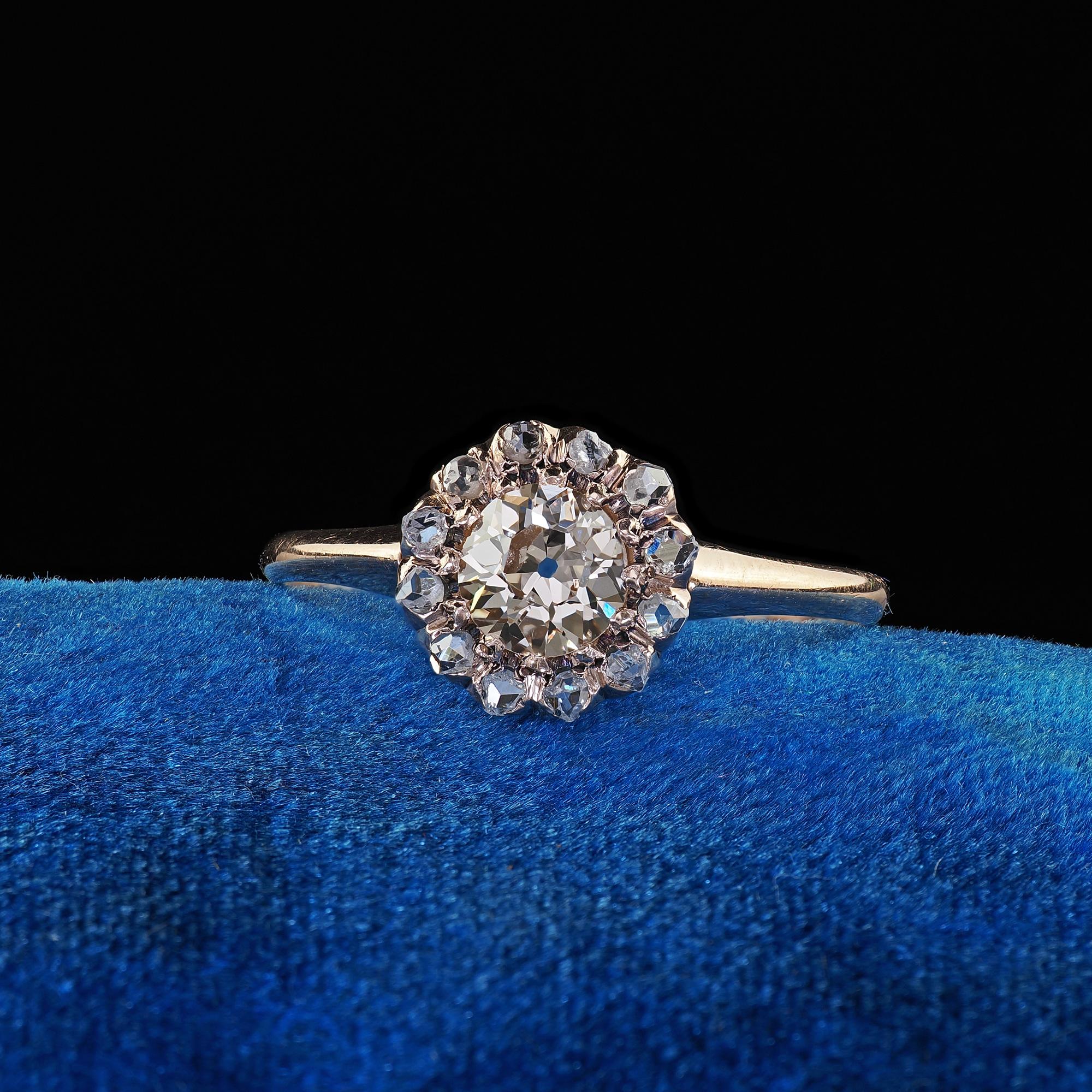 Beautiful Antique Victorian 9K Rose Gold Old Mine Cut Diamond Cluster Engagement Ring. This beautiful old mine cut diamond engagement ring is crafted in 9k rose gold. The ring features a beautiful old mine cut diamond in the center and is surrounded