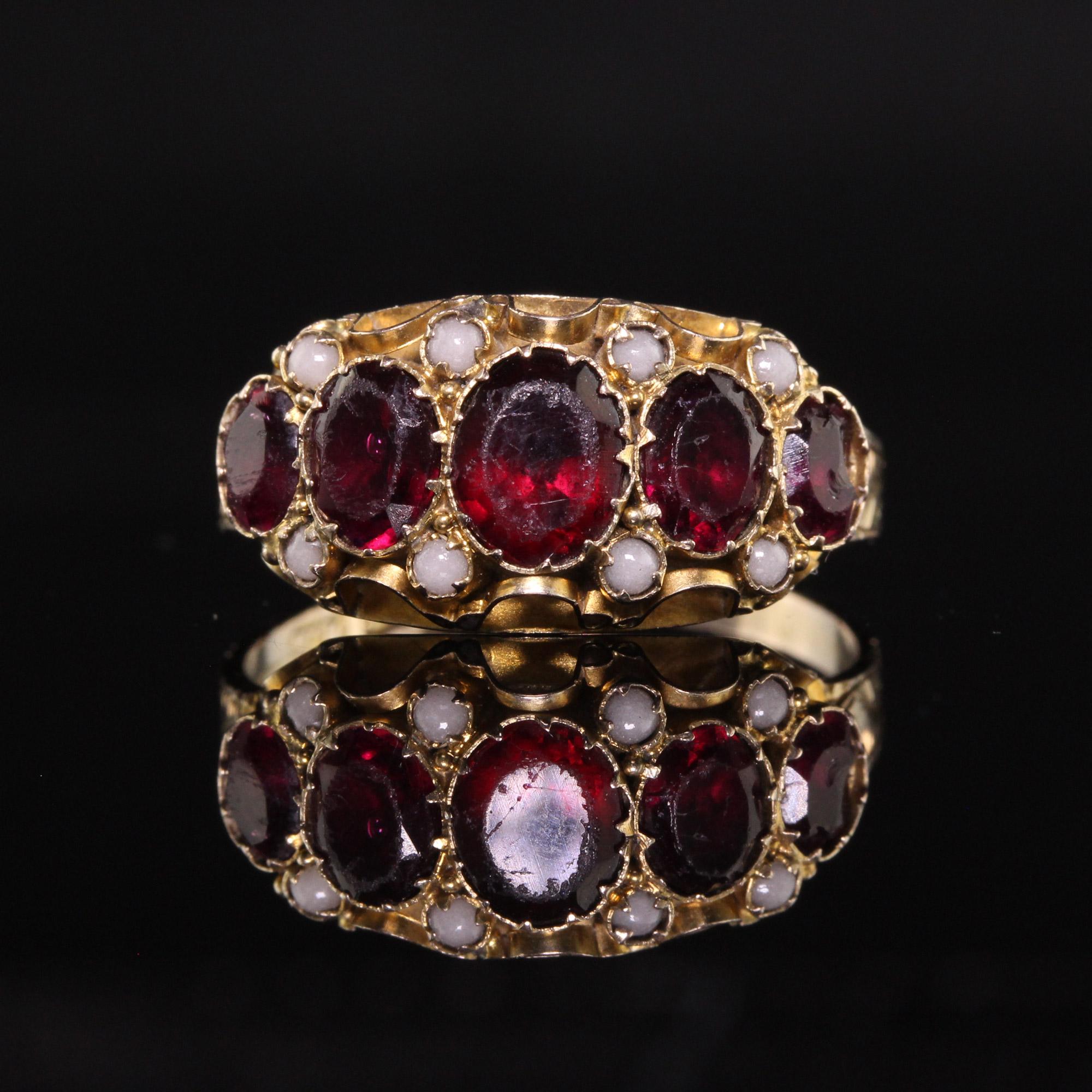 Oval Cut Antique Victorian 9K Yellow Gold Garnet and Seed Pearl Five Stone Ring