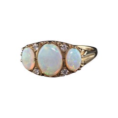 Antique Victorian 9K Yellow Gold Opal and Diamond Three Stone Ring