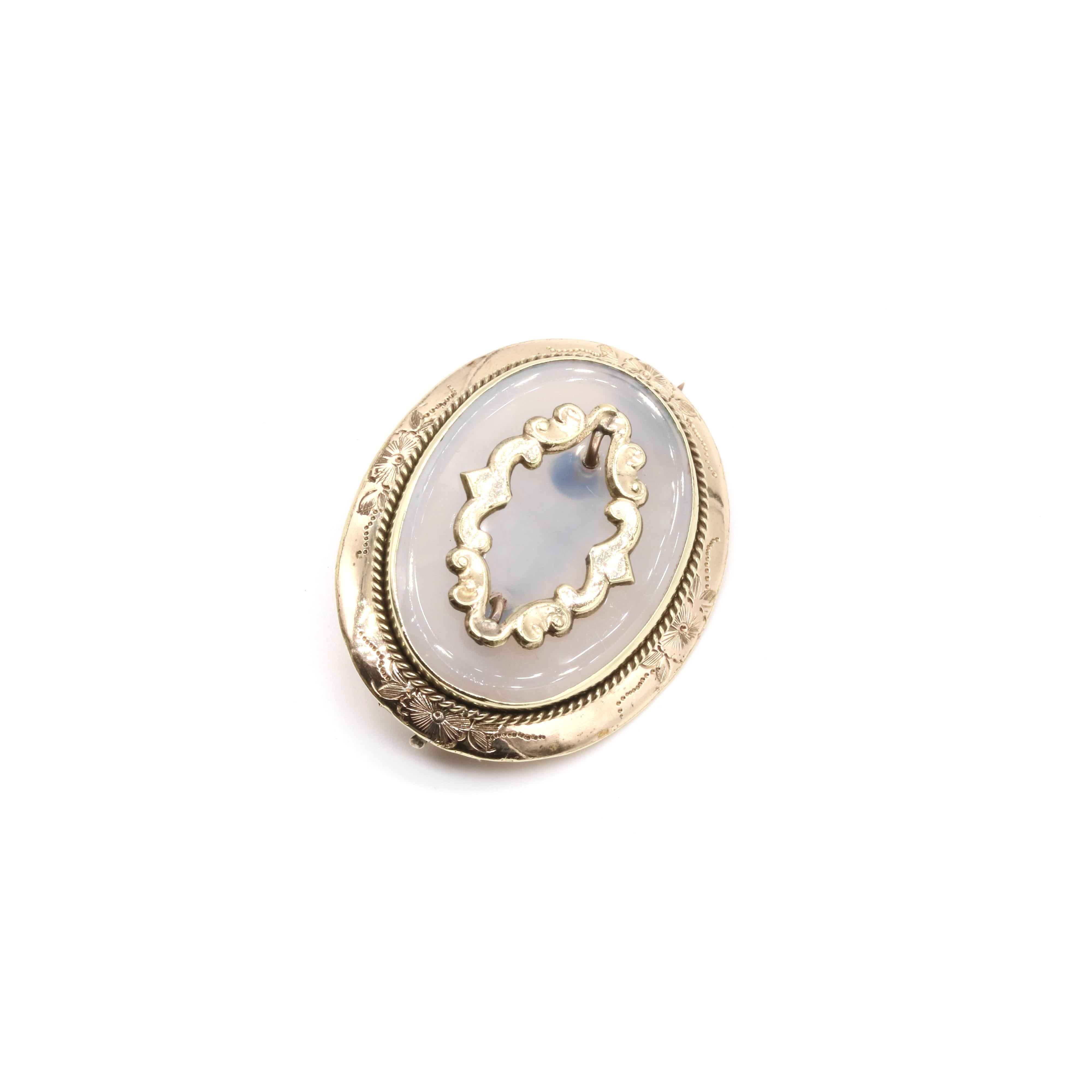Women's or Men's Antique Victorian 9K Yellow Gold Oval Engraved Chalcedony Brooch For Sale