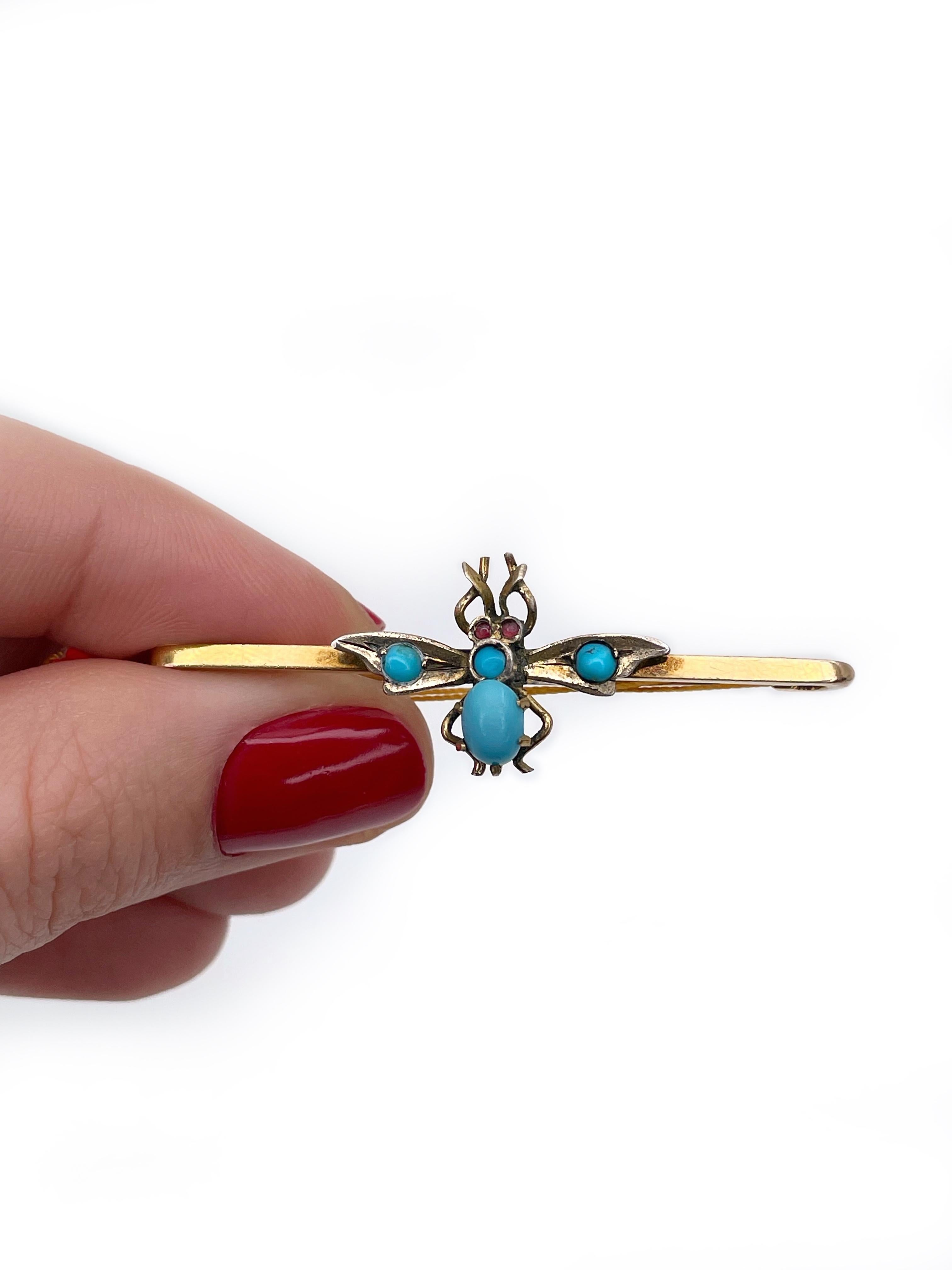 This is a typical Victorian insect jewellery example. It depicts a fly or a bee. The body is composed of cabochon cut turquoises. The eyes are made of small round rubies. The brooch is crafted in 9K yellow gold, the wings are silver plated. 

It is