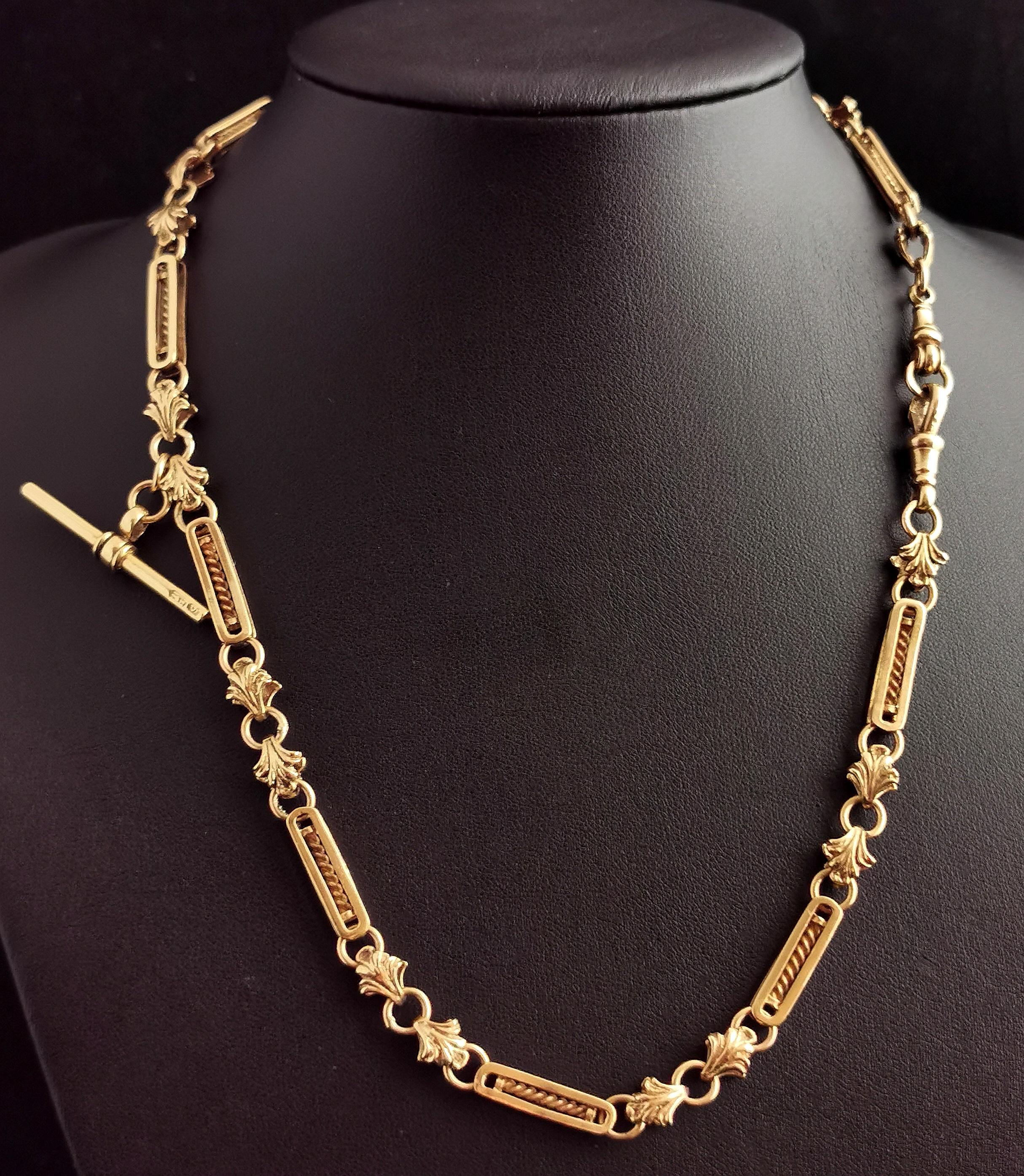 An outstanding antique, late Victorian era 9kt gold fancy link Albert chain.

This is one of the most decorative Albert chains I have seen with beautiful fancy bar and twist links consisting of bar links with twist designs within the bar itself,