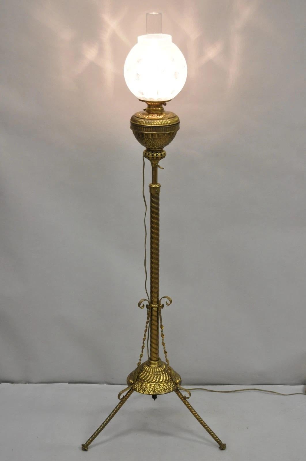 Please message us with your zip code to request a more reasonable domestic U.S. shipping quote.

Antique Victorian Adjustable Height Ornate Brass Converted Oil Lamp Parlor Piano Floor Lamp with Glass Shades. Circa Late 19th Century. Measurements: