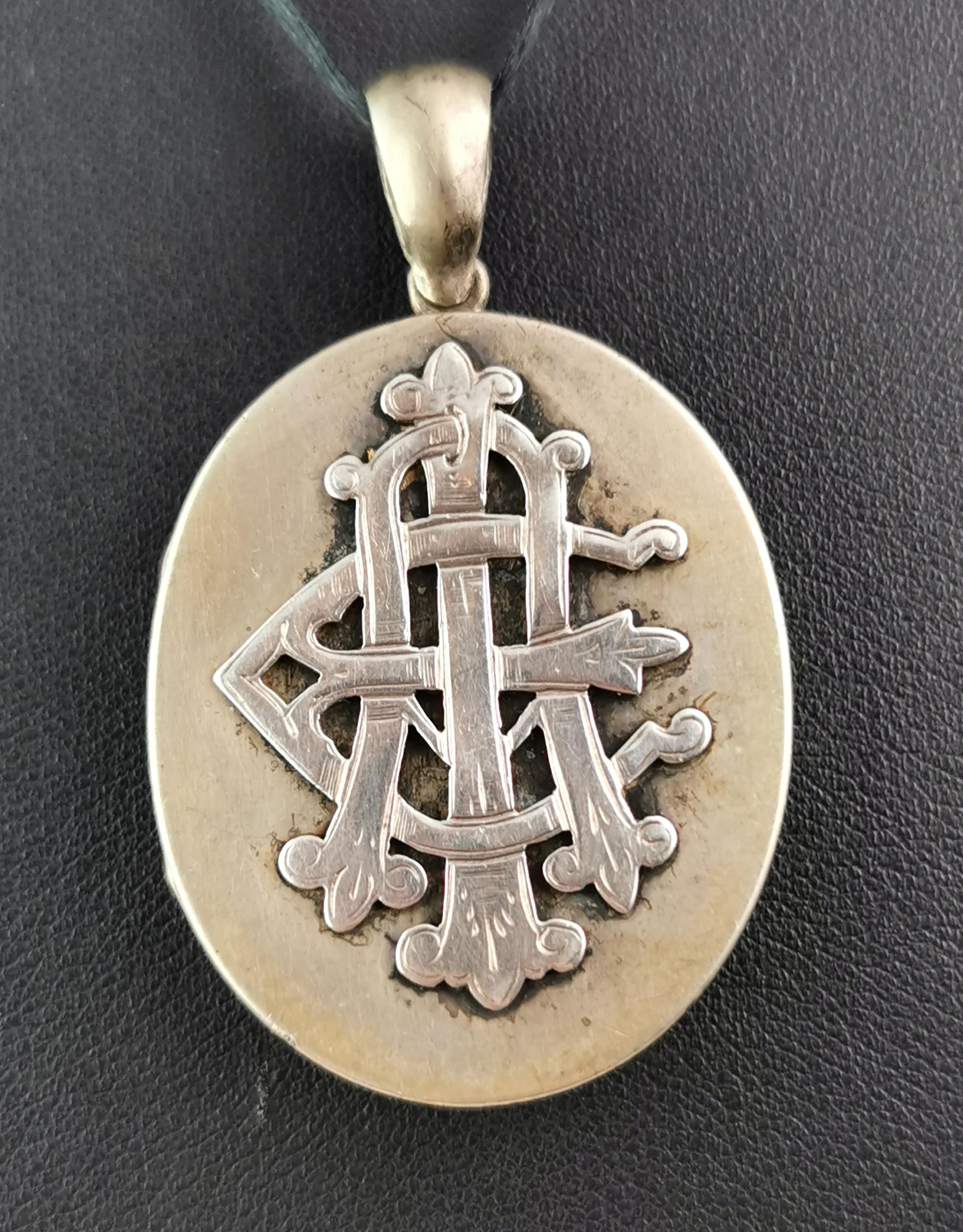 A fantastic antique Victorian era AEI locket pendant.

It is a silver plated locket with applied lettering to the front AEI in gothic script, this stands for Amity Eternity, Infinity this is thought to have Greek origins from the Greek meaning for
