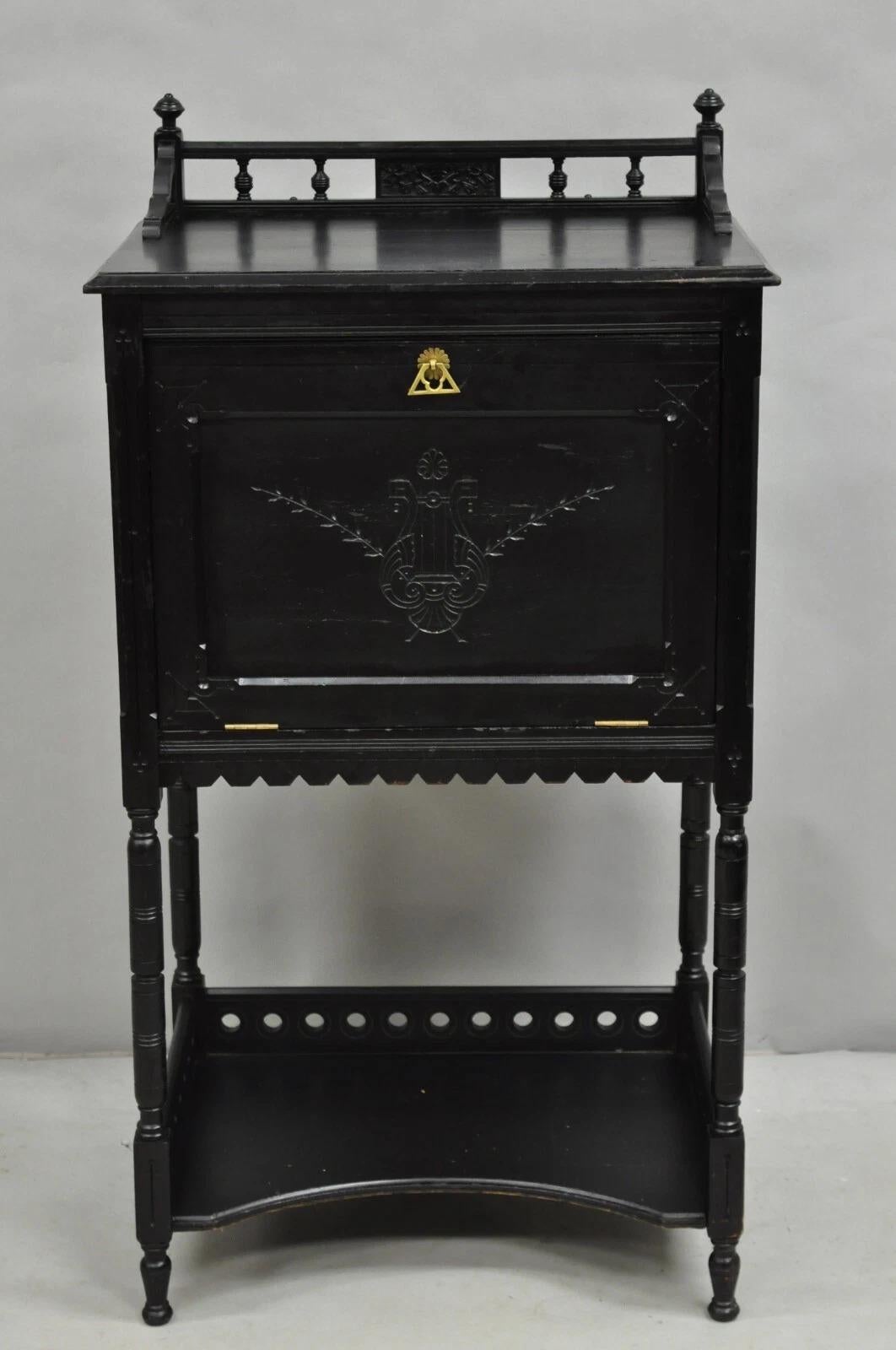 Please message us with your zip code to request a more reasonable domestic U.S. shipping quote.

Antique Victorian Aesthetic Movement Black Ebonized Music Stand Side Table. Circa Late 19th Century. Measurements: 41