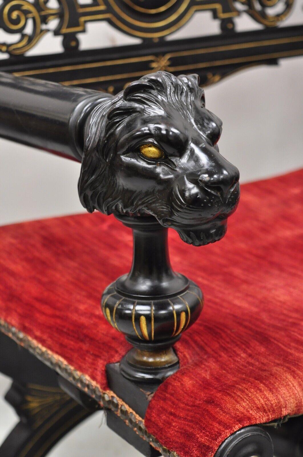 Antique Victorian Aesthetic Movement Ebonized Curule Throne Arm Chair with Lions In Good Condition For Sale In Philadelphia, PA