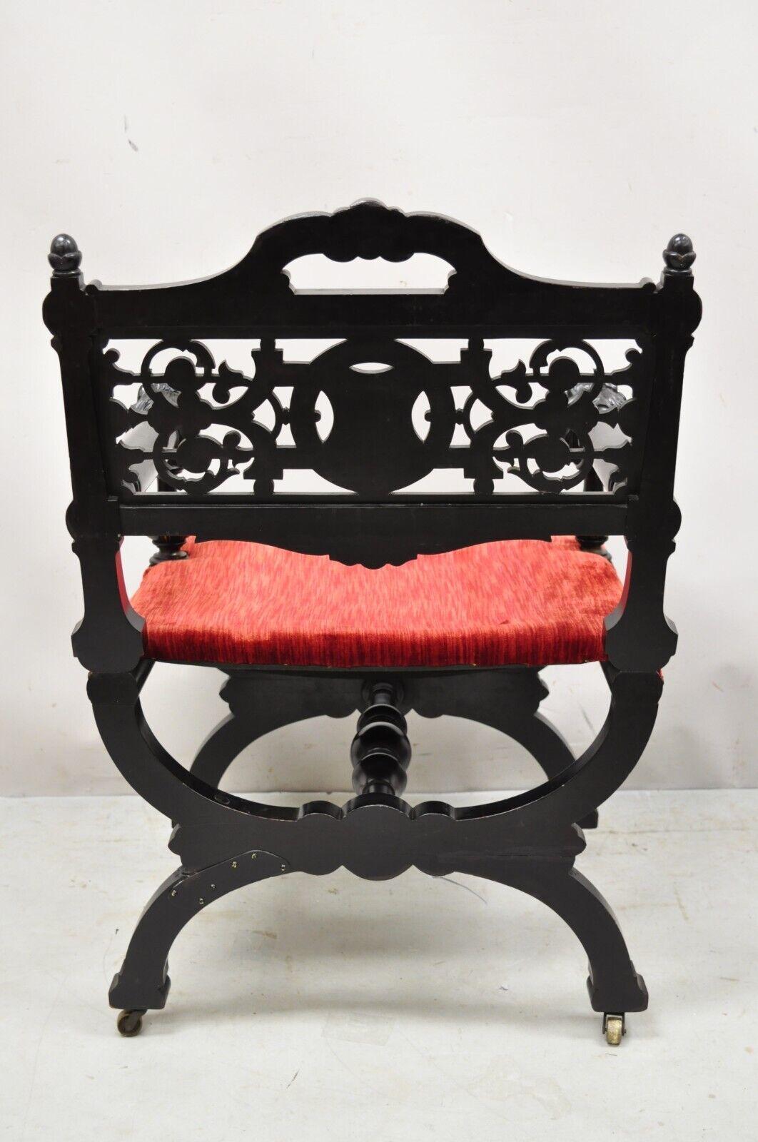 Wood Antique Victorian Aesthetic Movement Ebonized Curule Throne Arm Chair with Lions For Sale