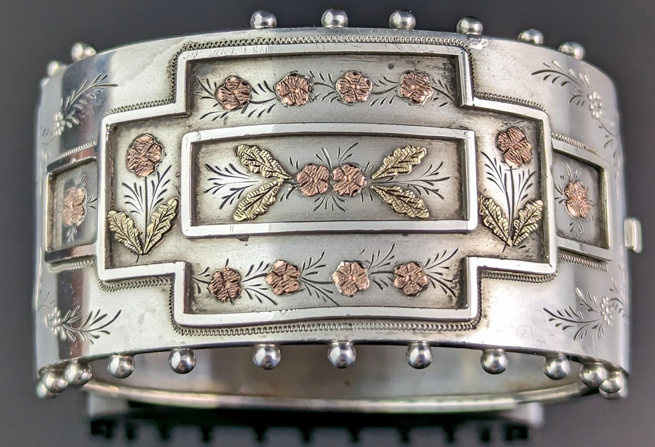 Antique Victorian aesthetic silver cuff bangle, 9k gold floral design In Fair Condition In NEWARK, GB