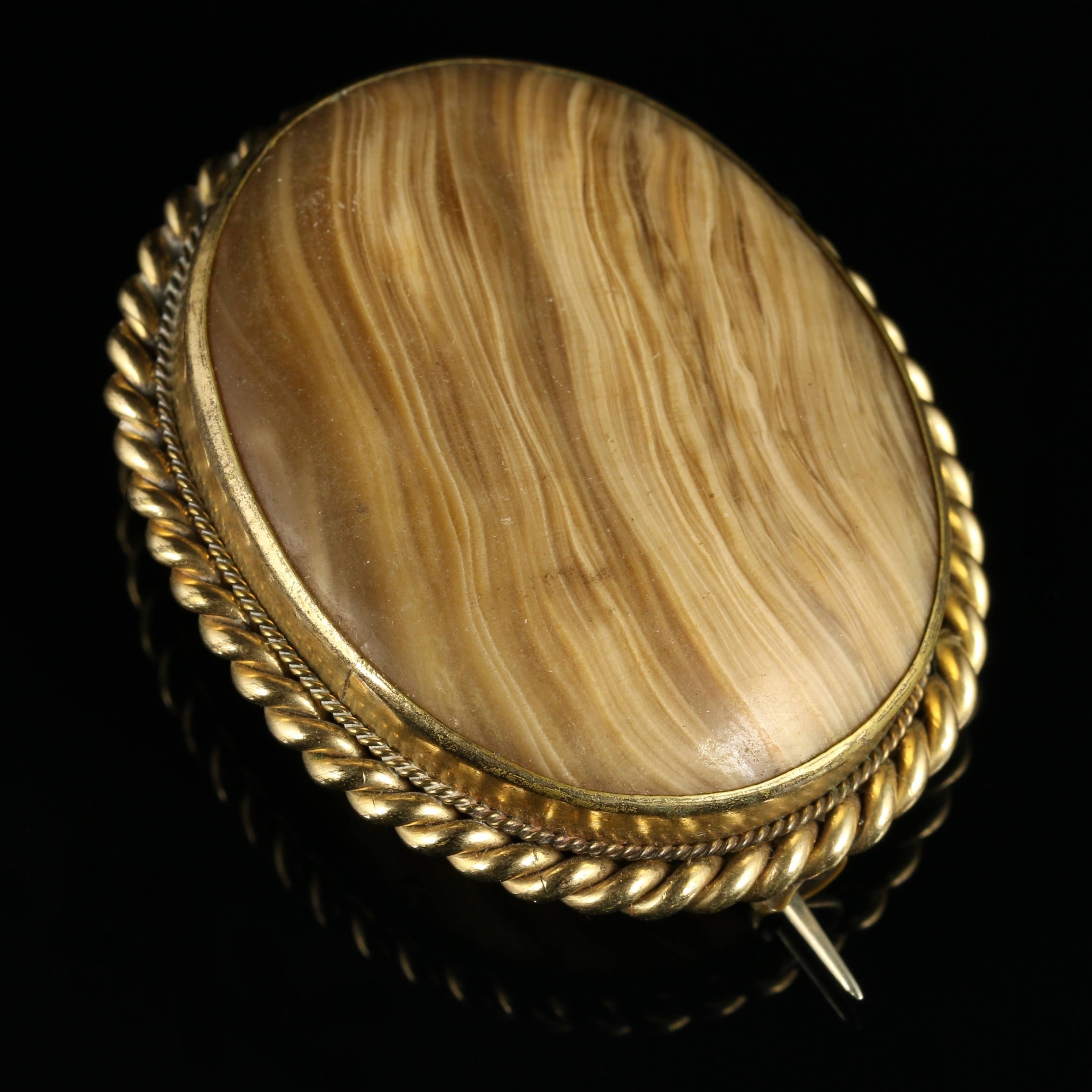 For more details please click continue reading down below...

This genuine antique Victorian large natural Agate brooch is Circa 1900.

Set in 9ct Yellow Gold.

The Agate shows the natural grain from within.

Agate has a balancing and healing energy