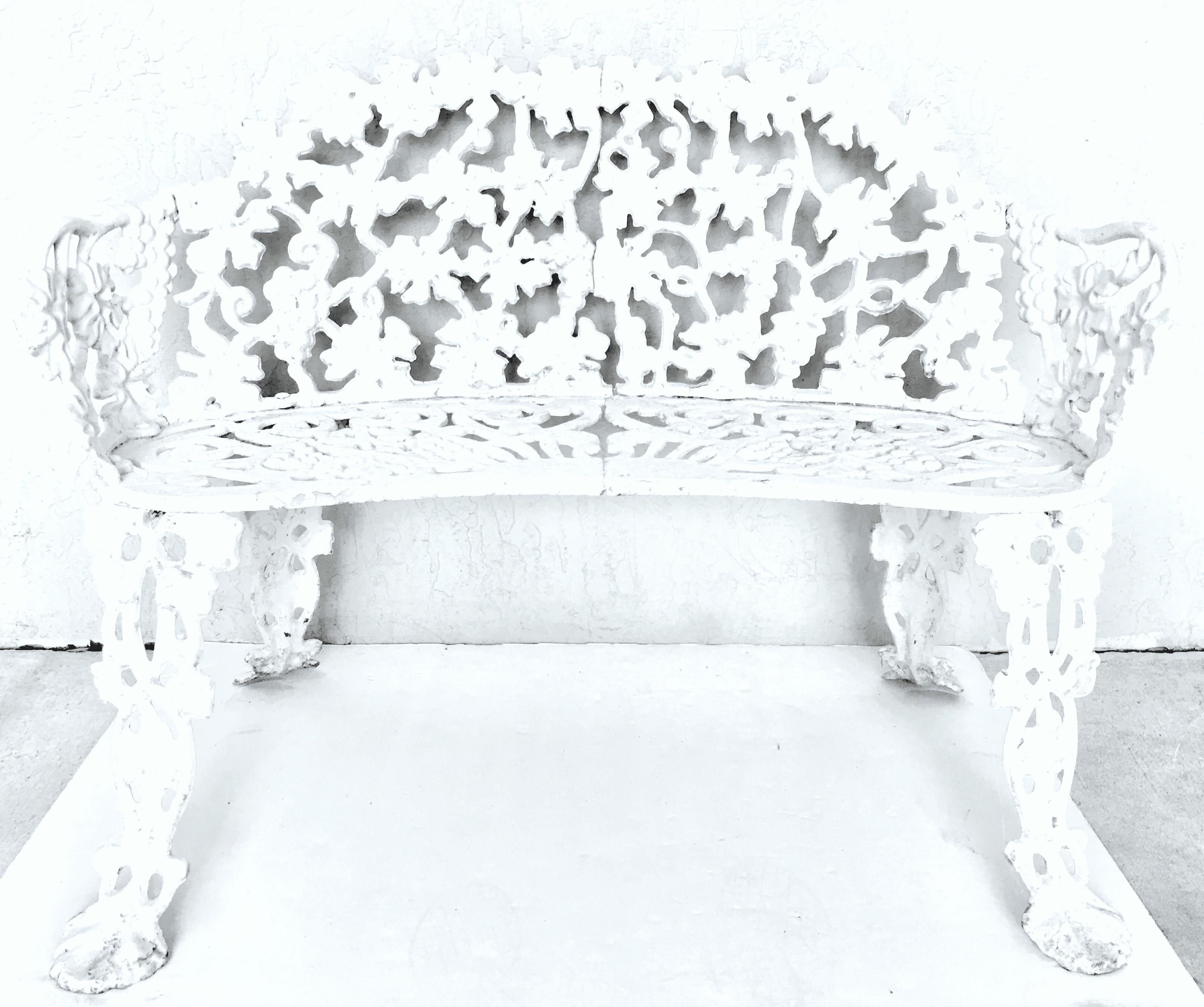 Antique Victorian American Berry, leaf & vine motif, three foot cast iron curved bench. This heavy duty bench, painted white with a shabby chic finish has a 14