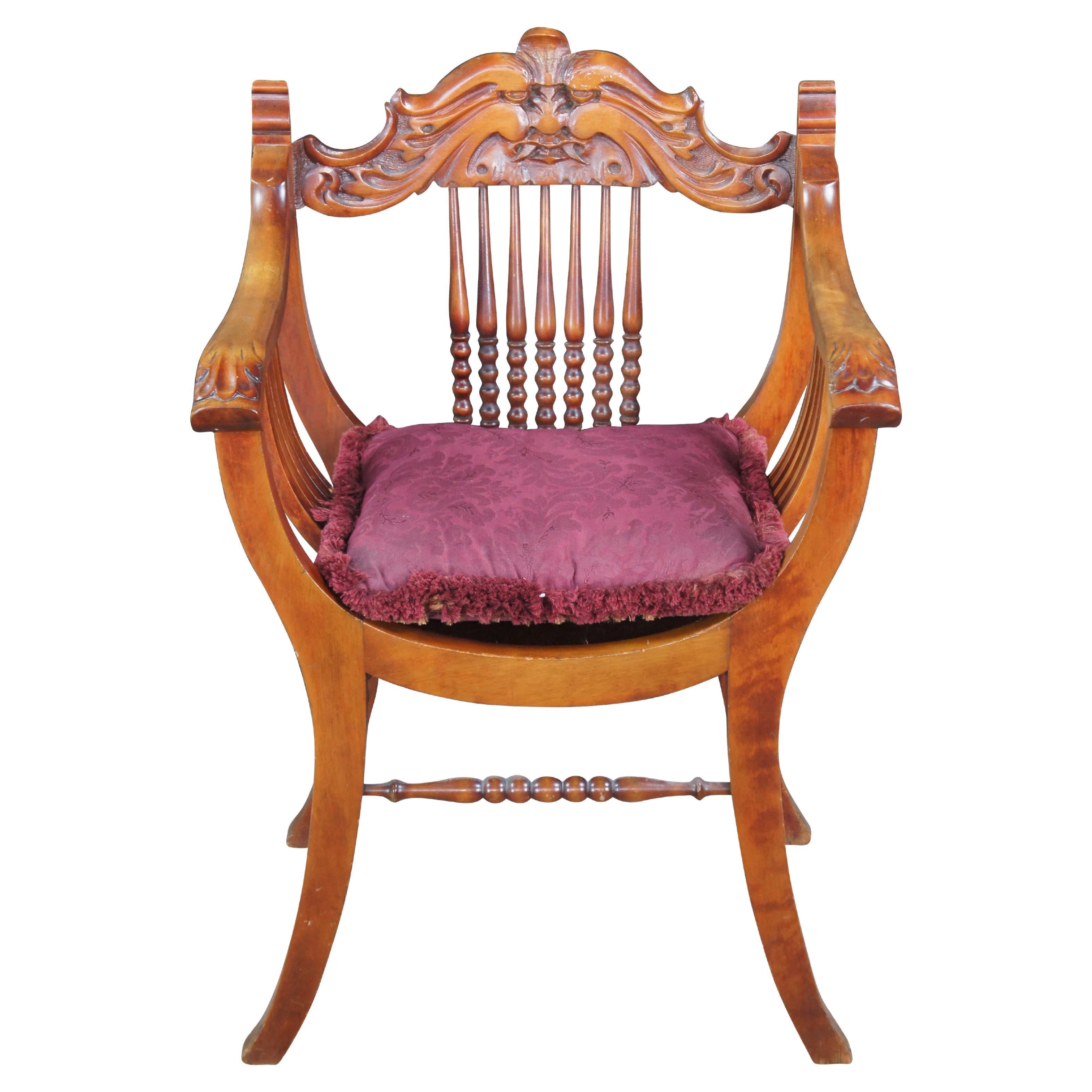 Antique Victorian Grotesque / Northwind arm chair by Michigan Chair Company circa 1905.  Made of mahogny featuring steambent design with curule saddle seat and figural back.  The design comes from Ancient Rome and Europe through the early 20th