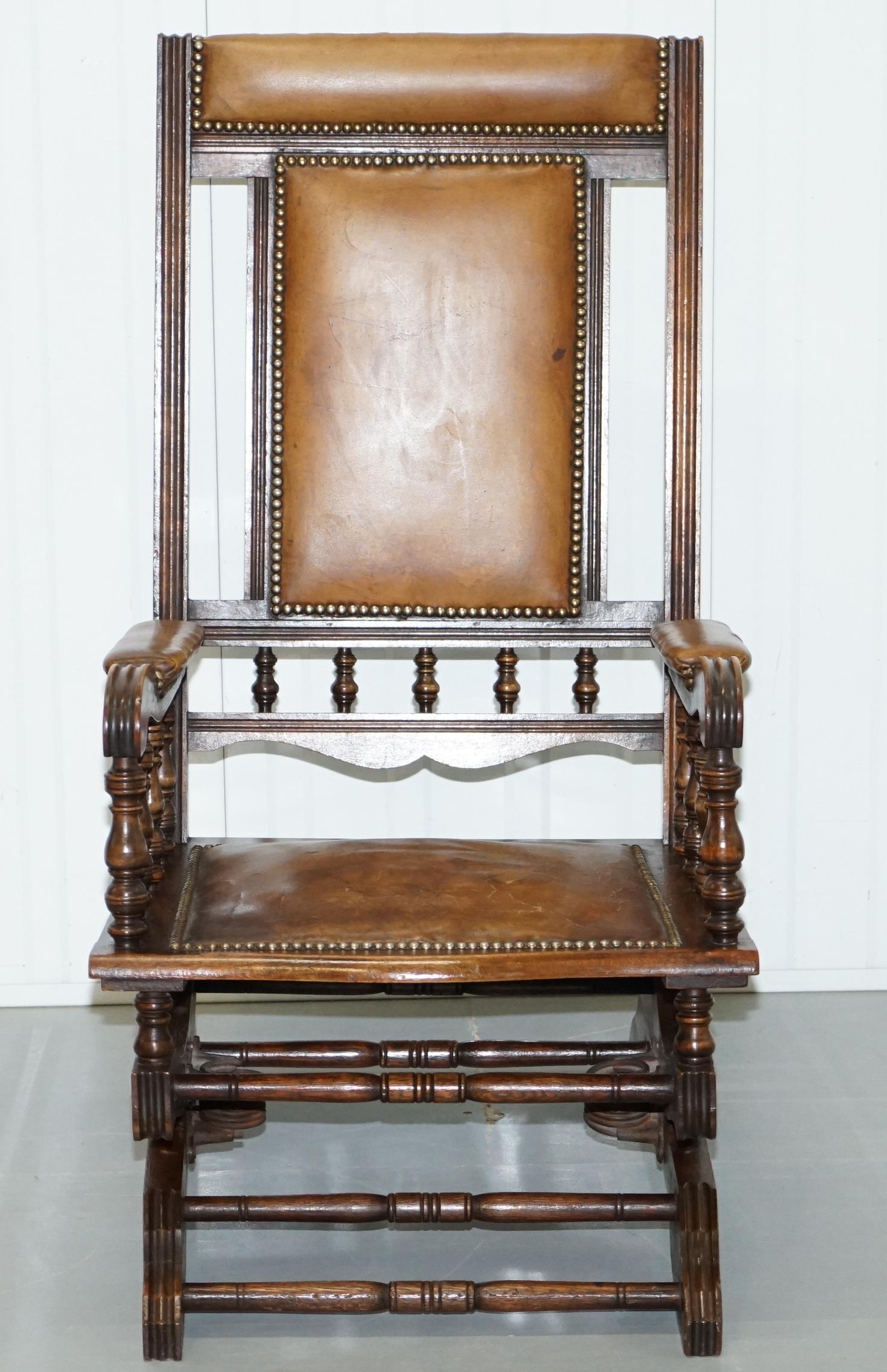 We are delighted to offer for sale this lovely Victorian American aged brown leather mahogany rocking armchair

A good-looking well made and comfortable chair, you can tell the American rockers as they have these little double springs either side