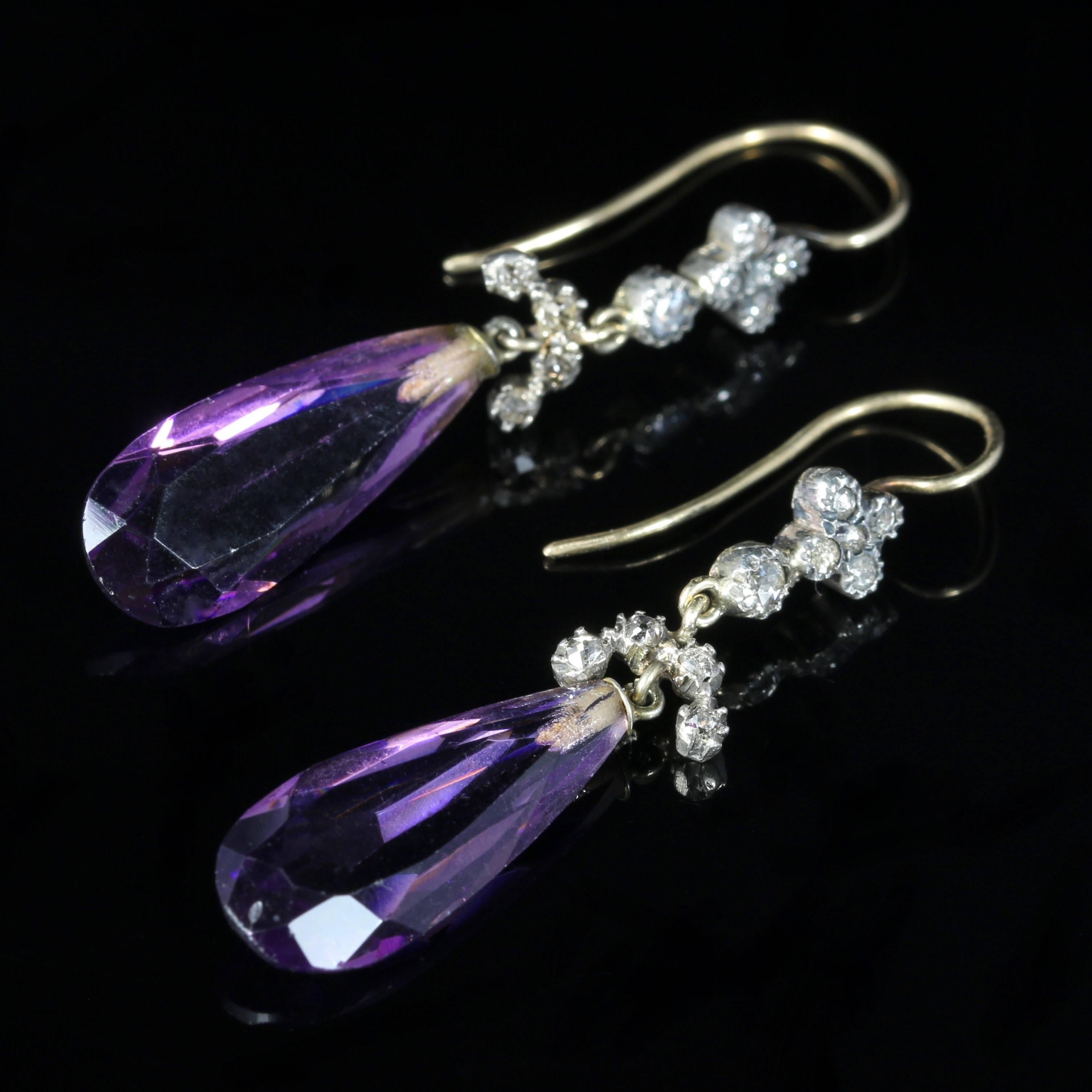 For more details please click continue reading down below...

These gorgeous 18ct Yellow Gold earrings are set with Amethysts and Old Cut Diamonds.

Circa 1880

The Diamonds are lovely and sparkly leading to a beautiful briolette cut Amethyst which