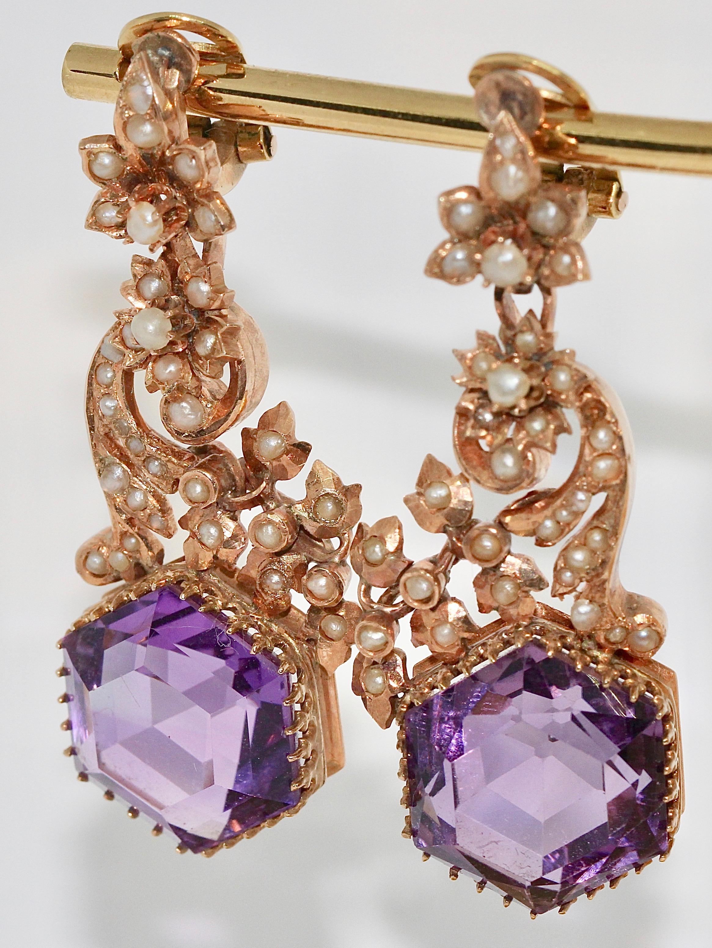 Antique Victorian Amethyst Earrings with natural Pearls. 14 Karat Rose Gold.

We also offer the suitable enhancer/ pendant. Take a look at our other offers.