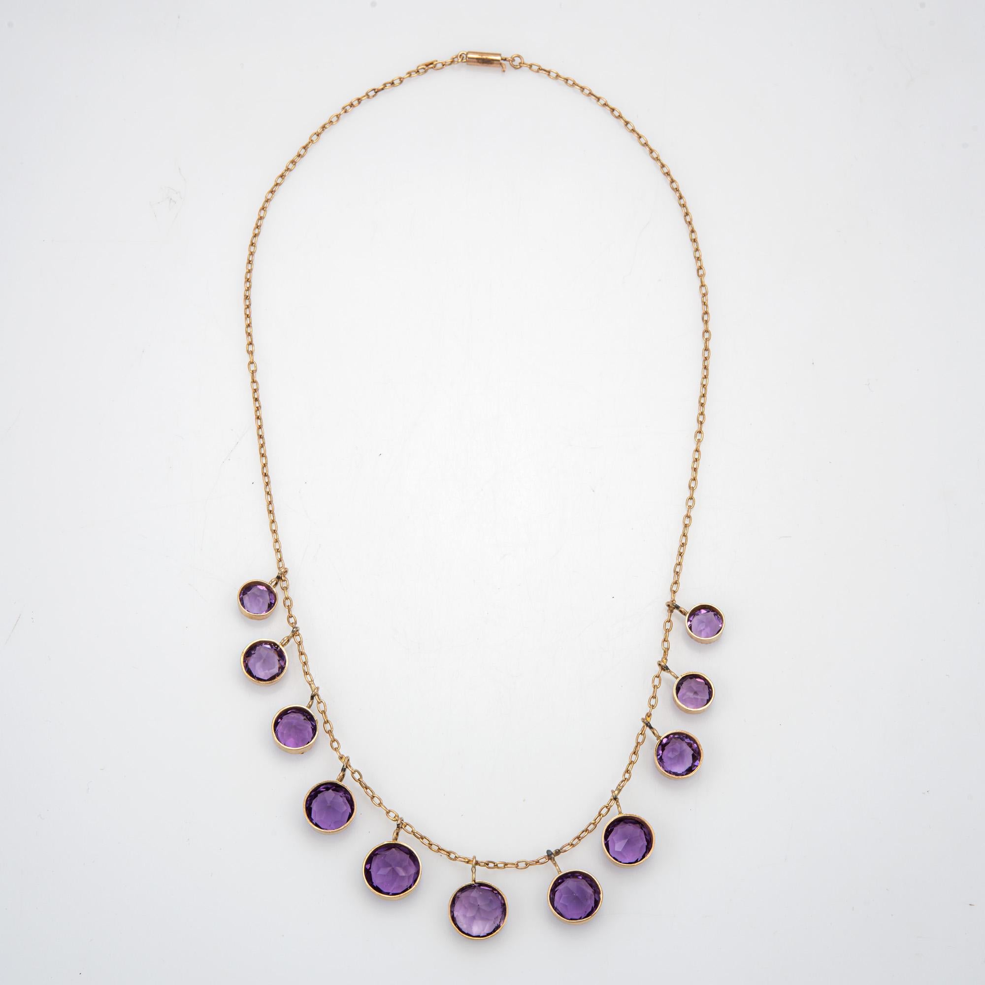 Finely detailed antique Victorian amethyst fringe necklace (circa 
1880s to 1900s), crafted in 10 karat yellow gold. 

Round faceted amethysts graduate in size from 7mm to 10mm. The amethysts are in good condition and free of cracks or chips.  

The