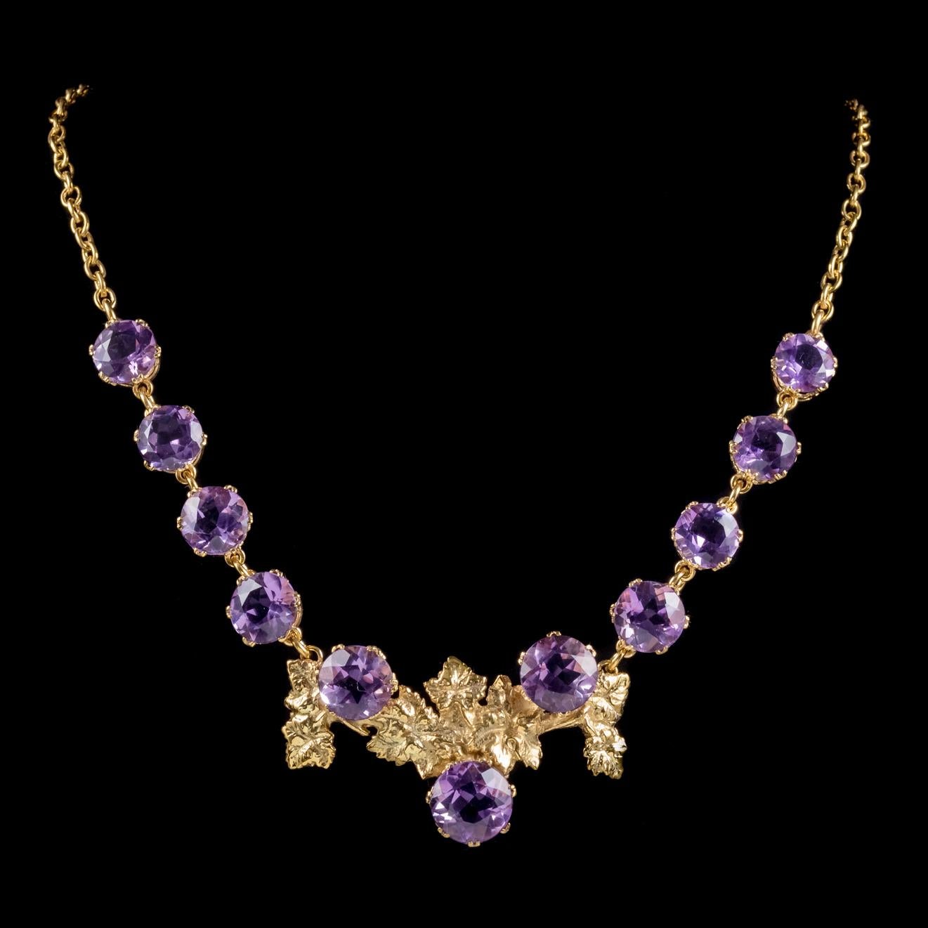 A wonderful antique Victorian necklace C. 1900, set with eleven gorgeous Amethyst’s claw set in a lovely engraved Grape Vine gallery. 

The Amethyst’s graduate in size with the largest measuring approx. 6ct and the smallest 3.5ct. 

Amethyst has