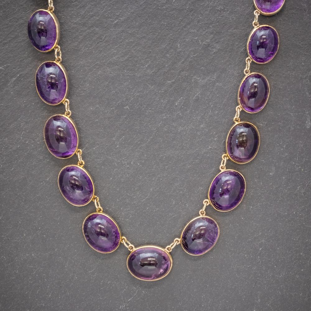 An exquisite antique collar necklace from the Victorian era made up of seventeen fabulous Amethyst links which graduate in size with the largest stones weighing approx. 10ct each.  

The Amethysts are beautifully polished cabochon cut stones with a