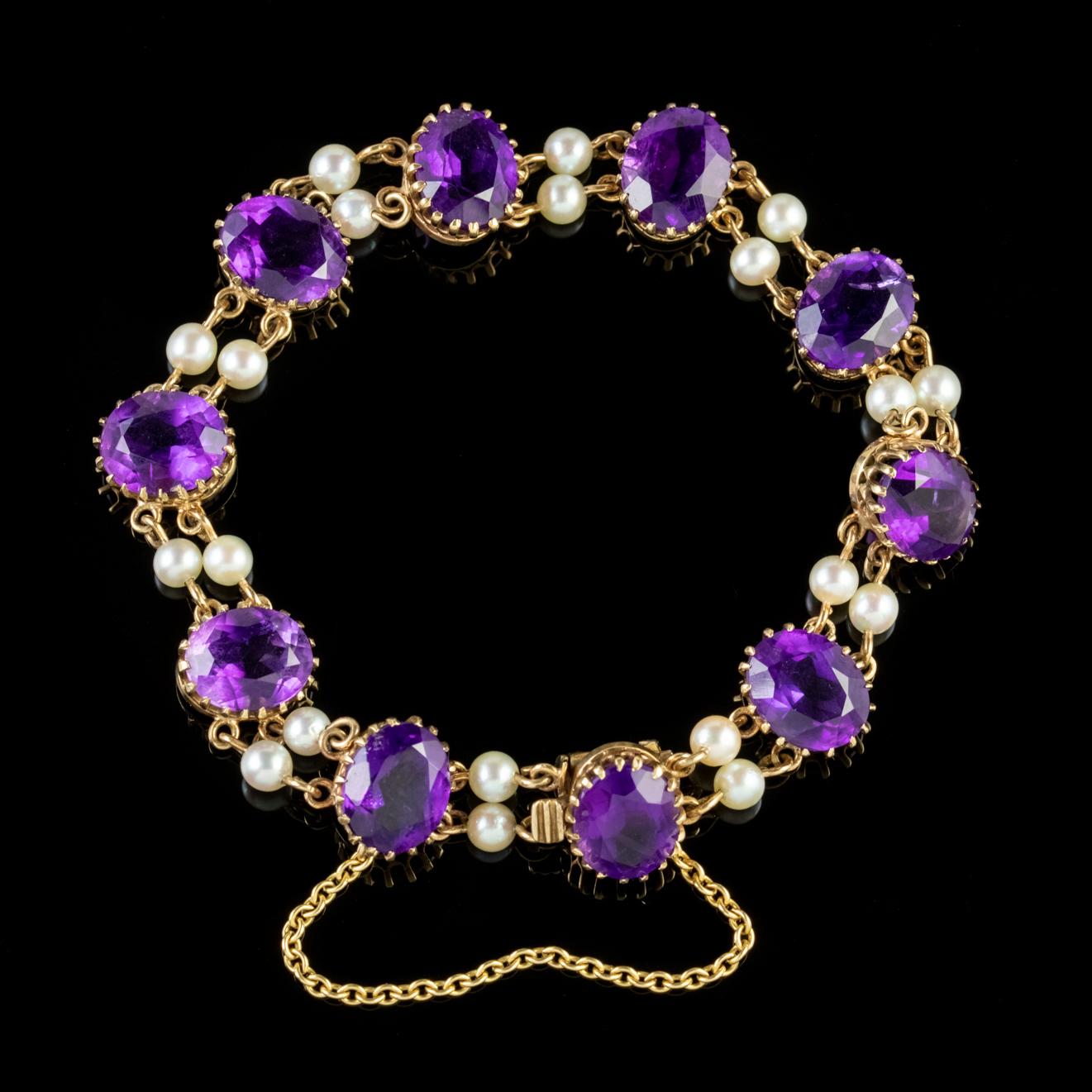 This elegant Victorian Amethyst and Pearl bracelet is beautifully crafted. Each 3.5ct Amethyst is securely held in an 9ct Yellow Gold, crown-shaped gallery, with each link interspersed with two bright Pearls. The box clasp is hallmarked with the