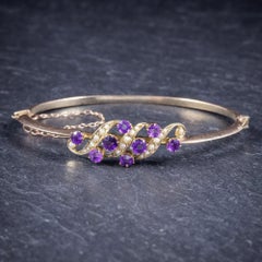 Antique Victorian Amethyst Pearl Bangle in 9 Carat Gold, circa 1900