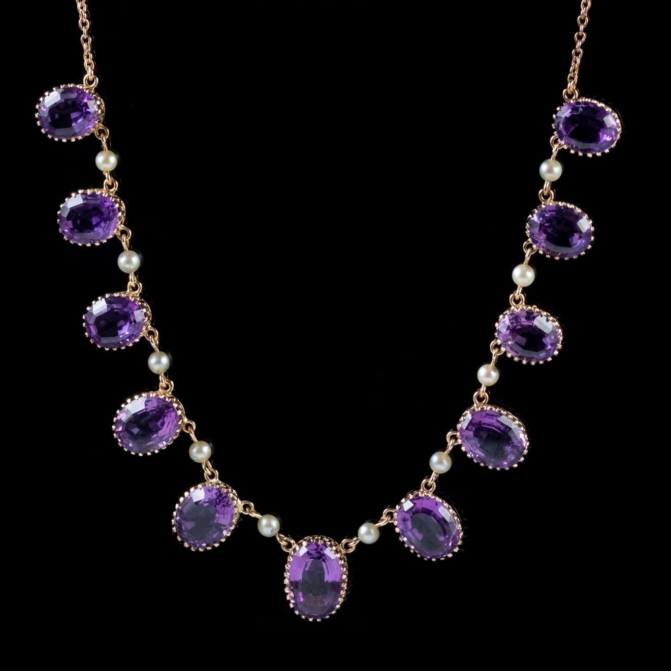 A fabulous antique Victorian 9ct Gold Garland necklace showcasing eleven rich purple Amethyst’s with small lustrous Pearls hung in-between. 

Amethyst has been highly esteemed throughout the ages for its stunning beauty and deep purple colouring