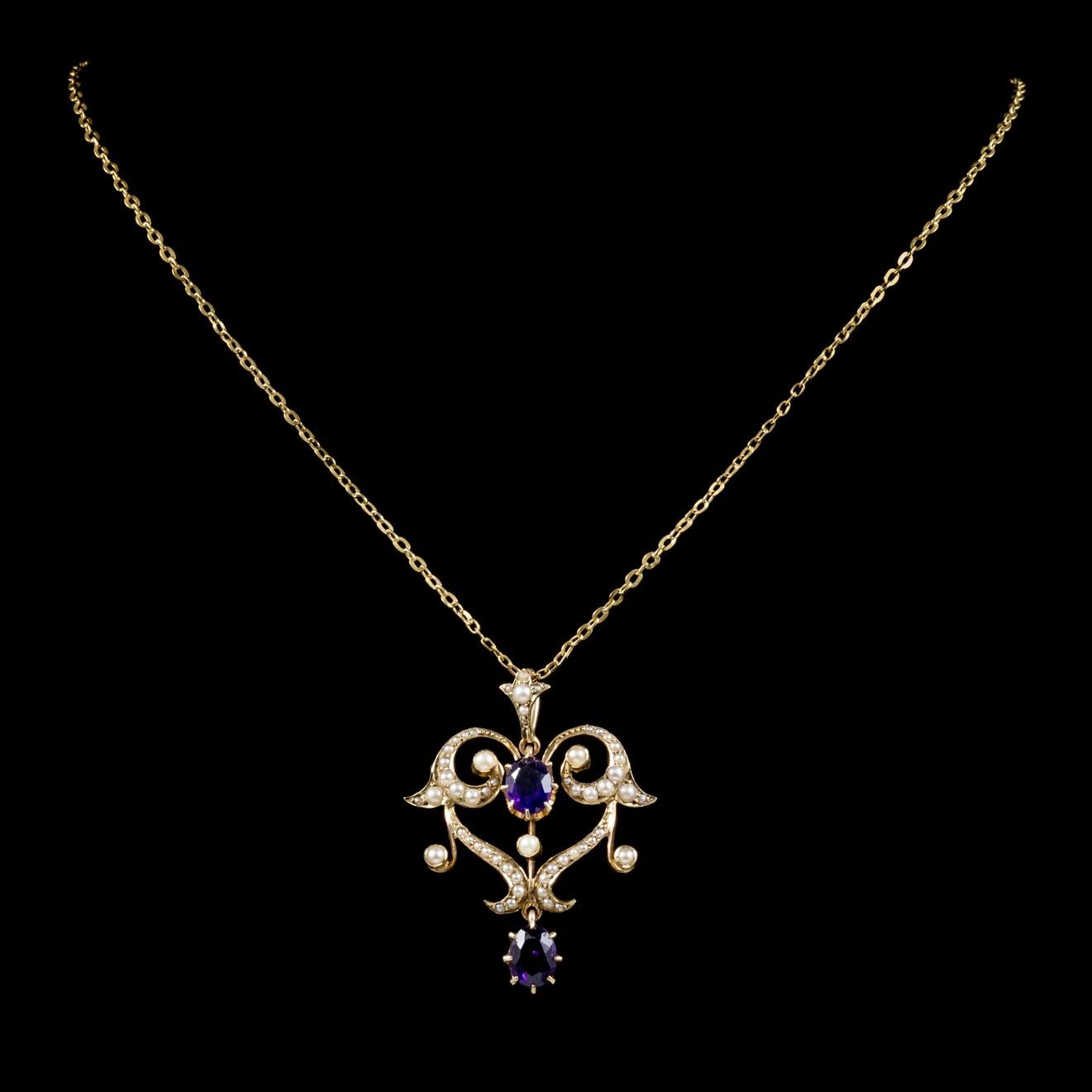 This beautiful antique Amethyst and Pearl pendant and chain is Victorian Circa 1880. 

Adorned with a 0.90ct Amethyst in the centre and a 0.90ct Amethyst dropper below. 

Amethyst has been highly esteemed throughout the ages for its stunning beauty