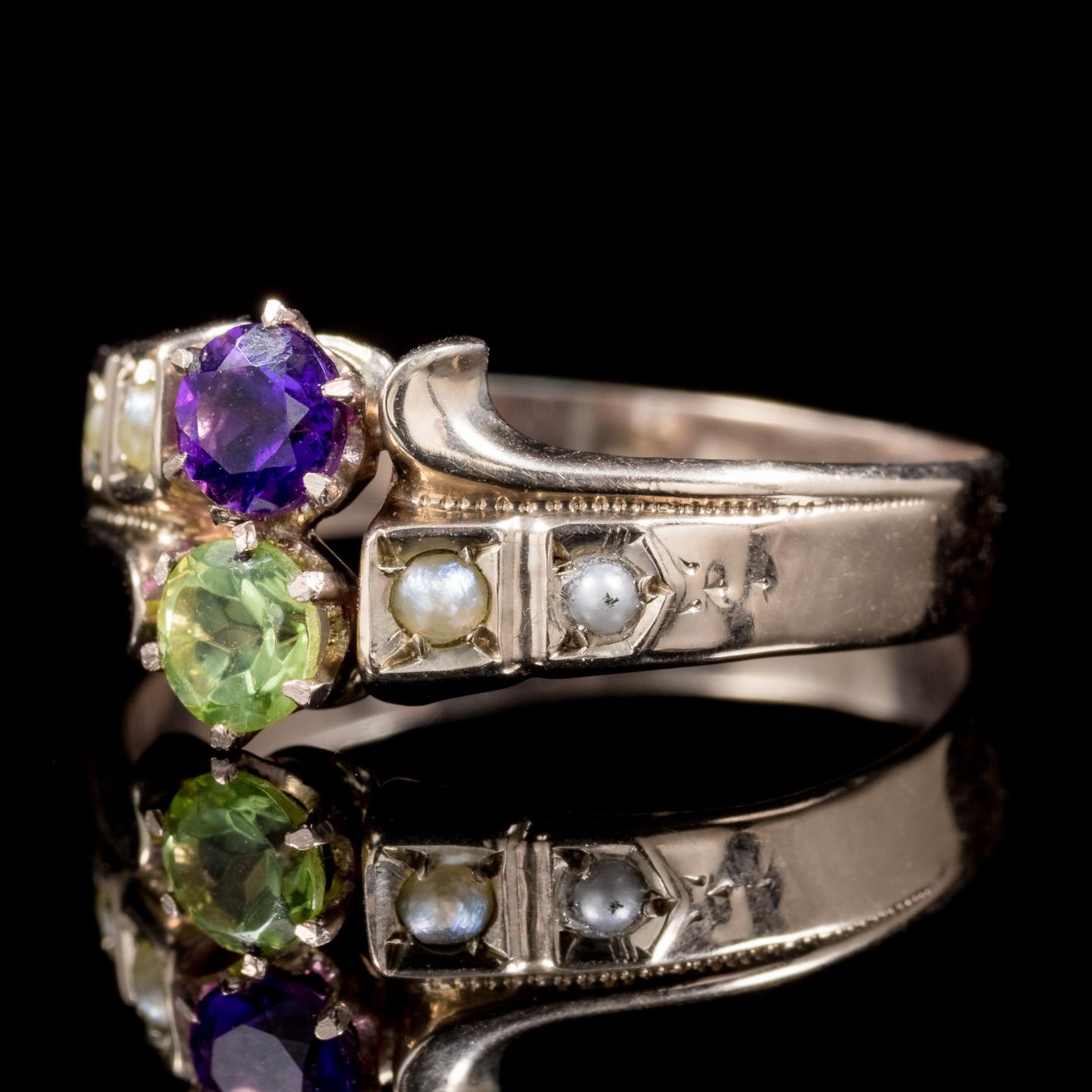 A stunning antique Victorian ring C. 1900, set with a 0.18ct violet Amethyst a 0.18ct green Peridot and four lovely Pearls which together represent the Suffragette movement. 

Suffragettes liked to be depicted as feminine, their jewellery popularly