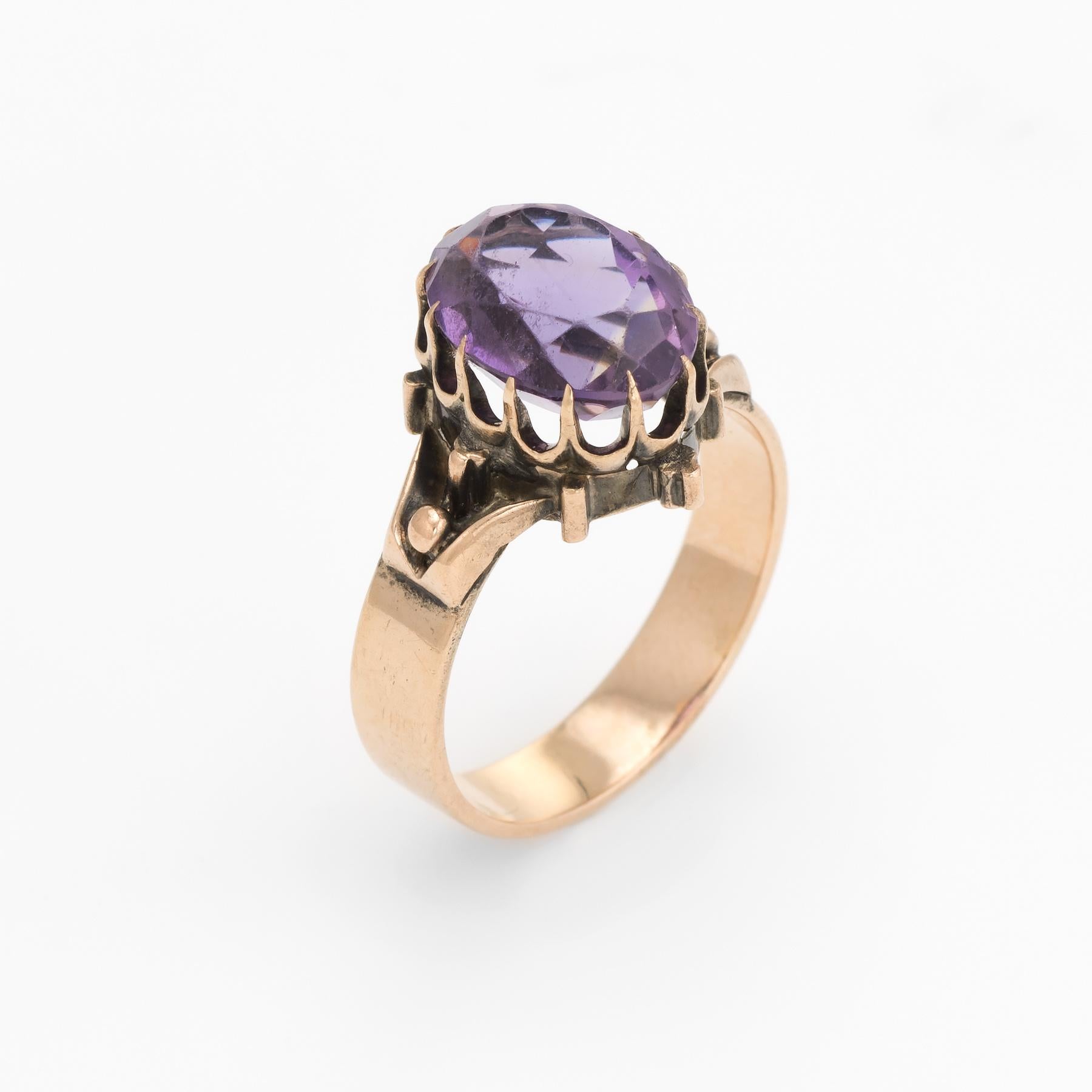 Finely detailed antique Victorian amethyst ring (circa 1880s to 1900s), crafted in 14 karat rose gold. 

Faceted oval cut amethyst measures 11mm x 8mm (estimated at 2.50 carats). The amethyst shows some light wear with surface abrasions evident