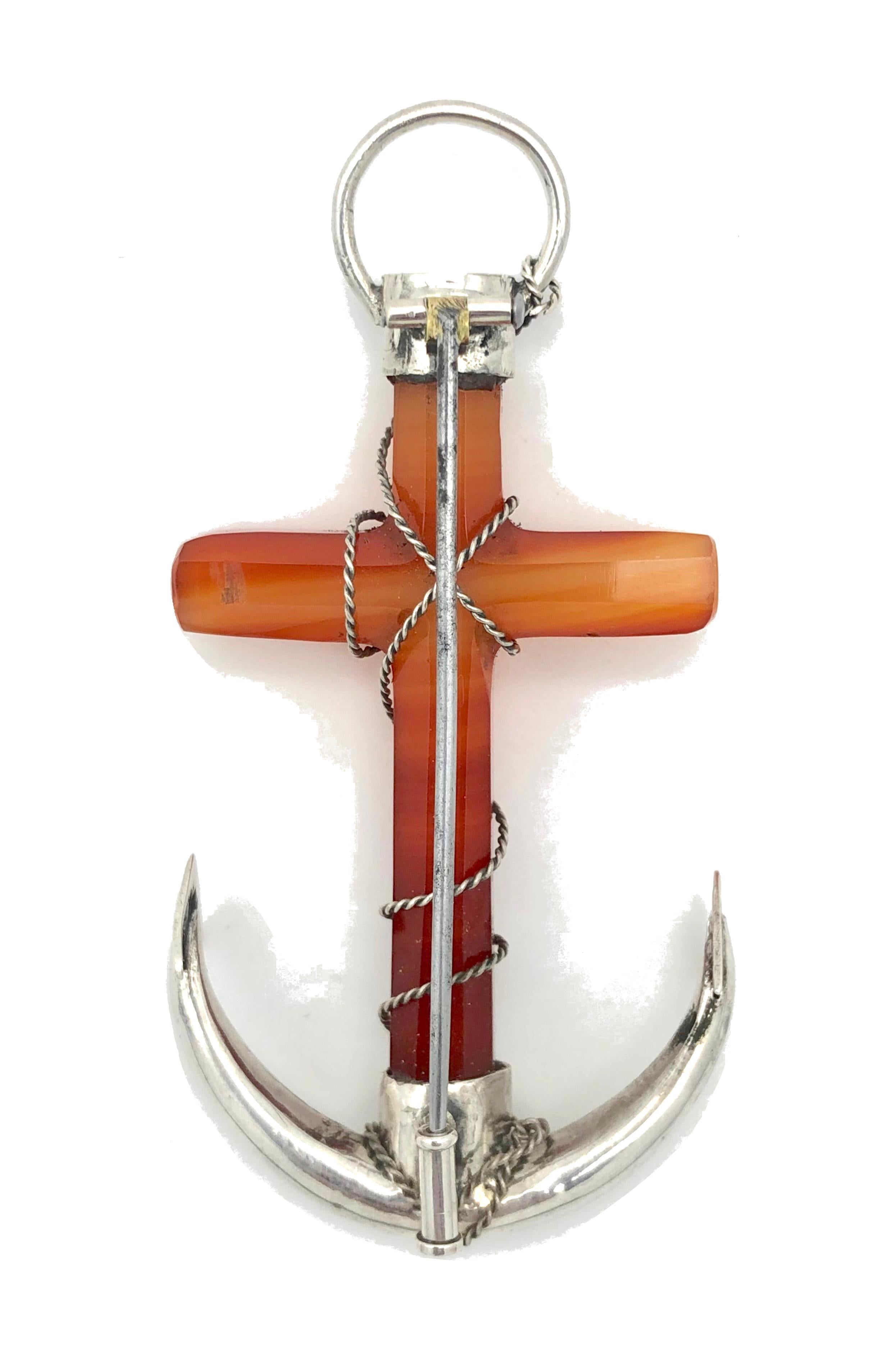 This good size Vitorian Brooch of an anchor symbolizes hop and faith. A facetted carnelian cross is mounted in silver and secured to the anchor by finely twisted silver wire. 