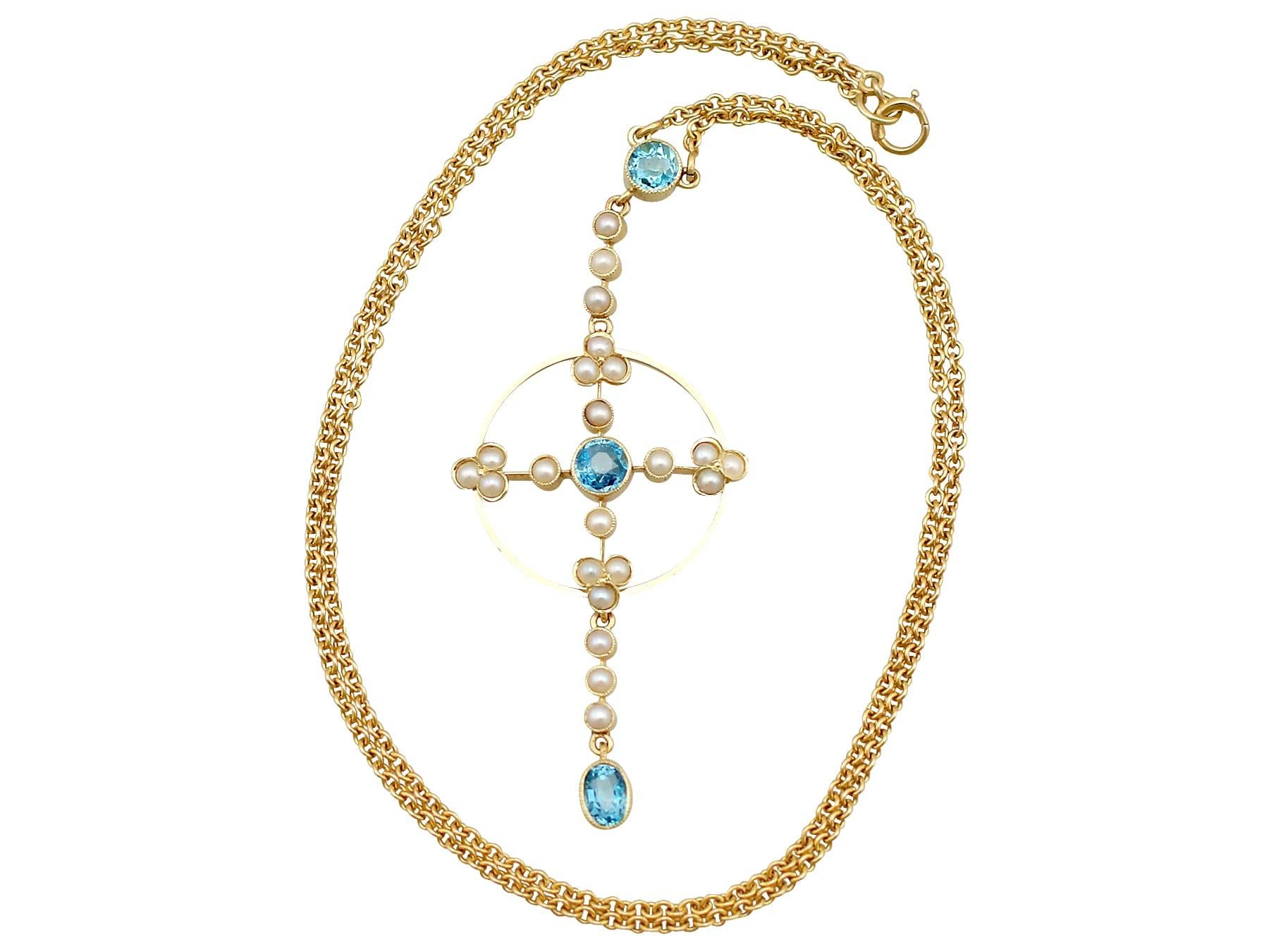 A fine and impressive antique 0.59 carat aquamarine and seed pearl pendant in 15 karat yellow gold; part of our diverse antique jewelry and estate jewelry collections.

This fine and impressive Victorian aquamarine and pearl pendant has been crafted